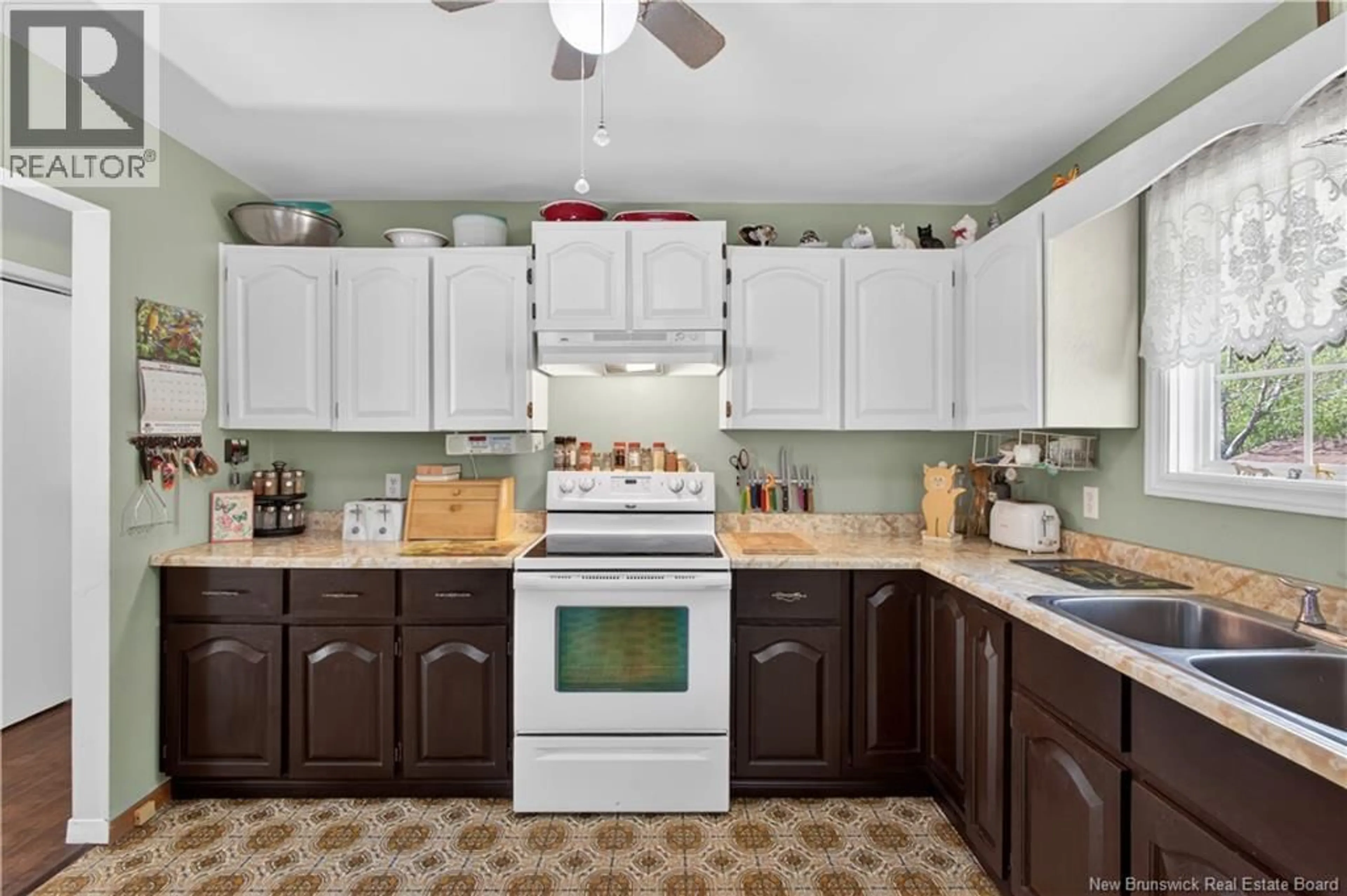 Open concept kitchen, ceramic/tile floor for 20 ADAMS AVENUE, Miramichi New Brunswick E1V3W9