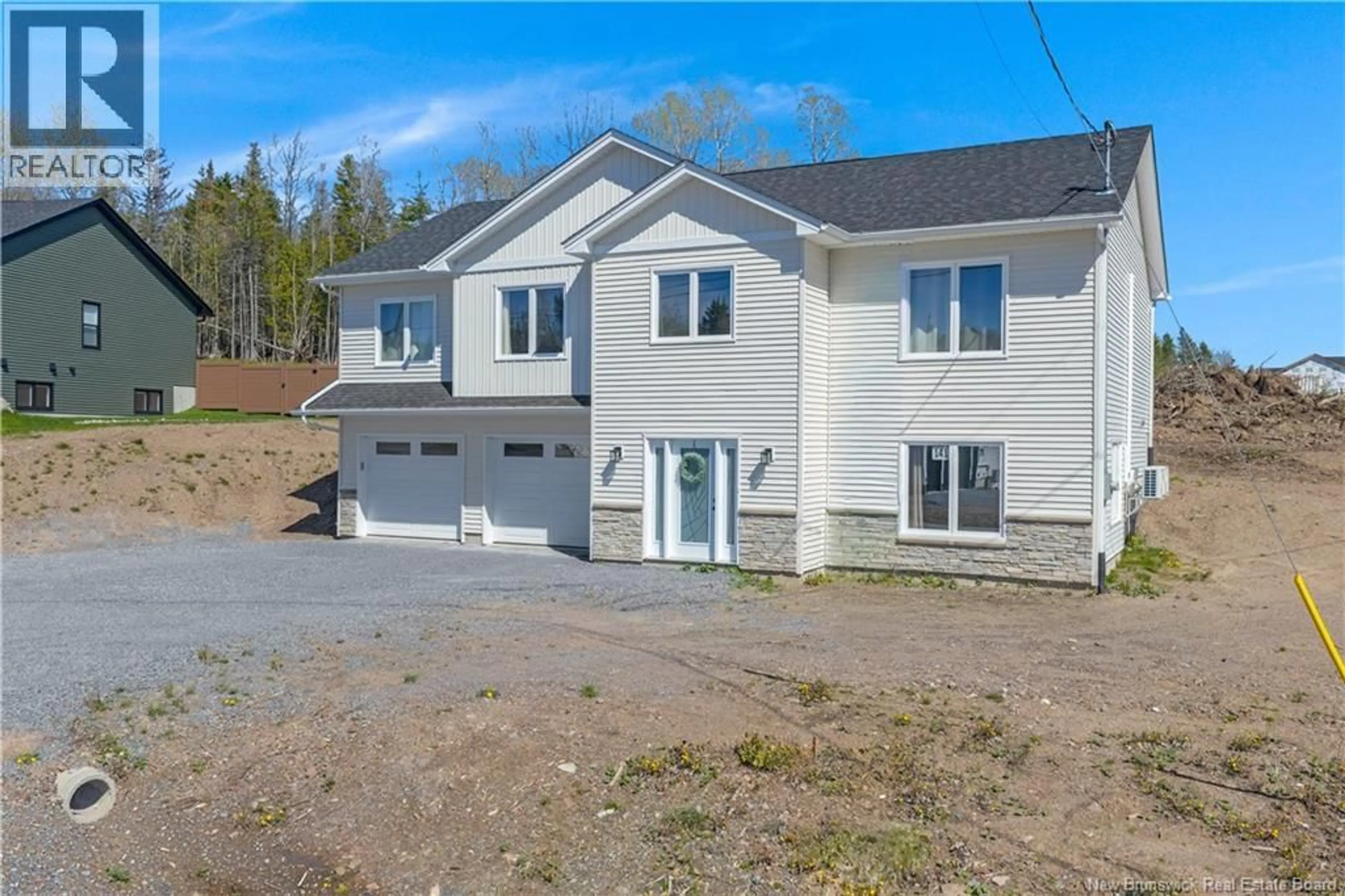 A pic from outside/outdoor area/front of a property/back of a property/a pic from drone, building for 141 MONTANA DRIVE, Quispamsis New Brunswick E2E0W1