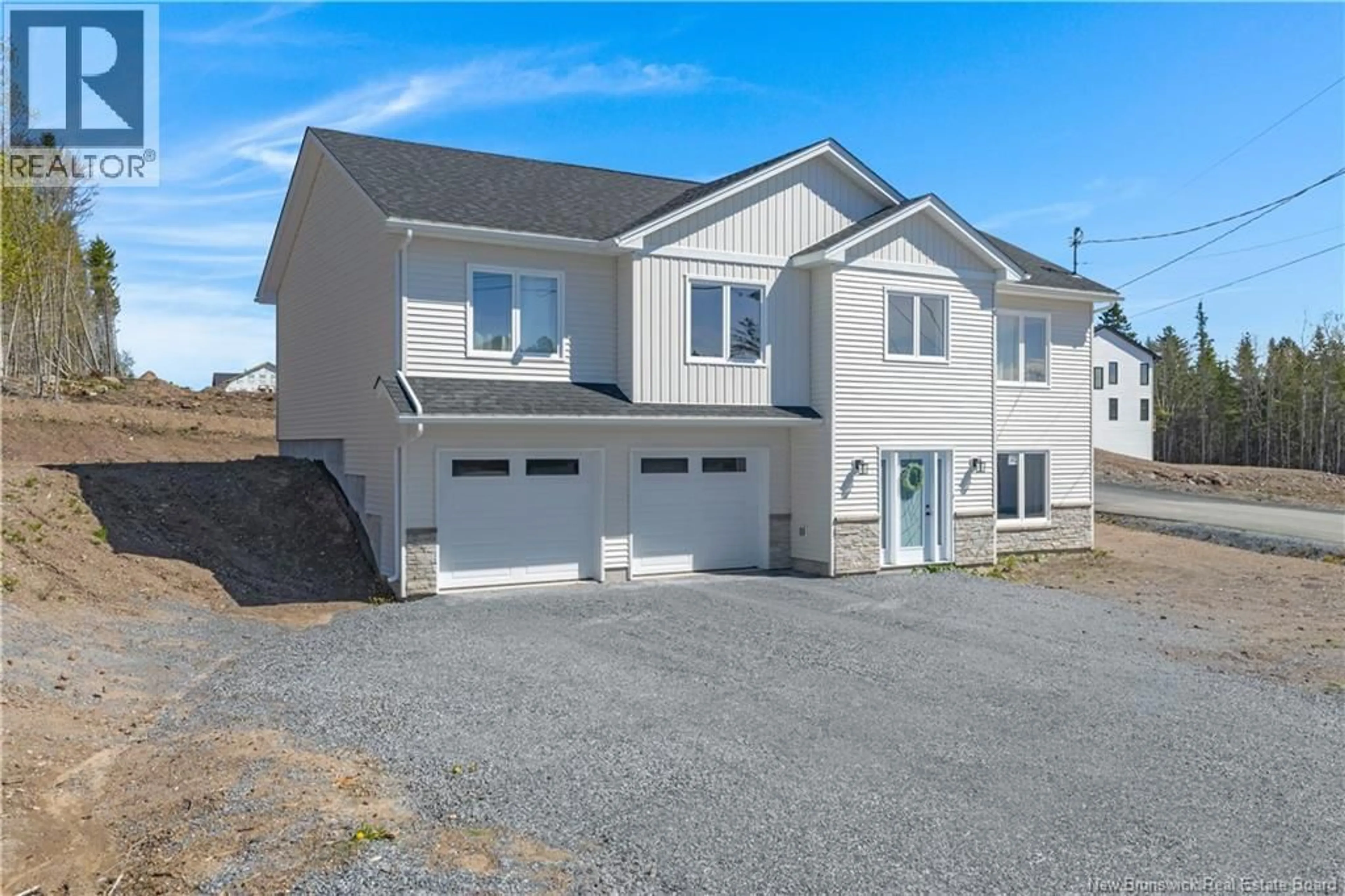 Home with vinyl exterior material, street for 141 MONTANA DRIVE, Quispamsis New Brunswick E2E0W1
