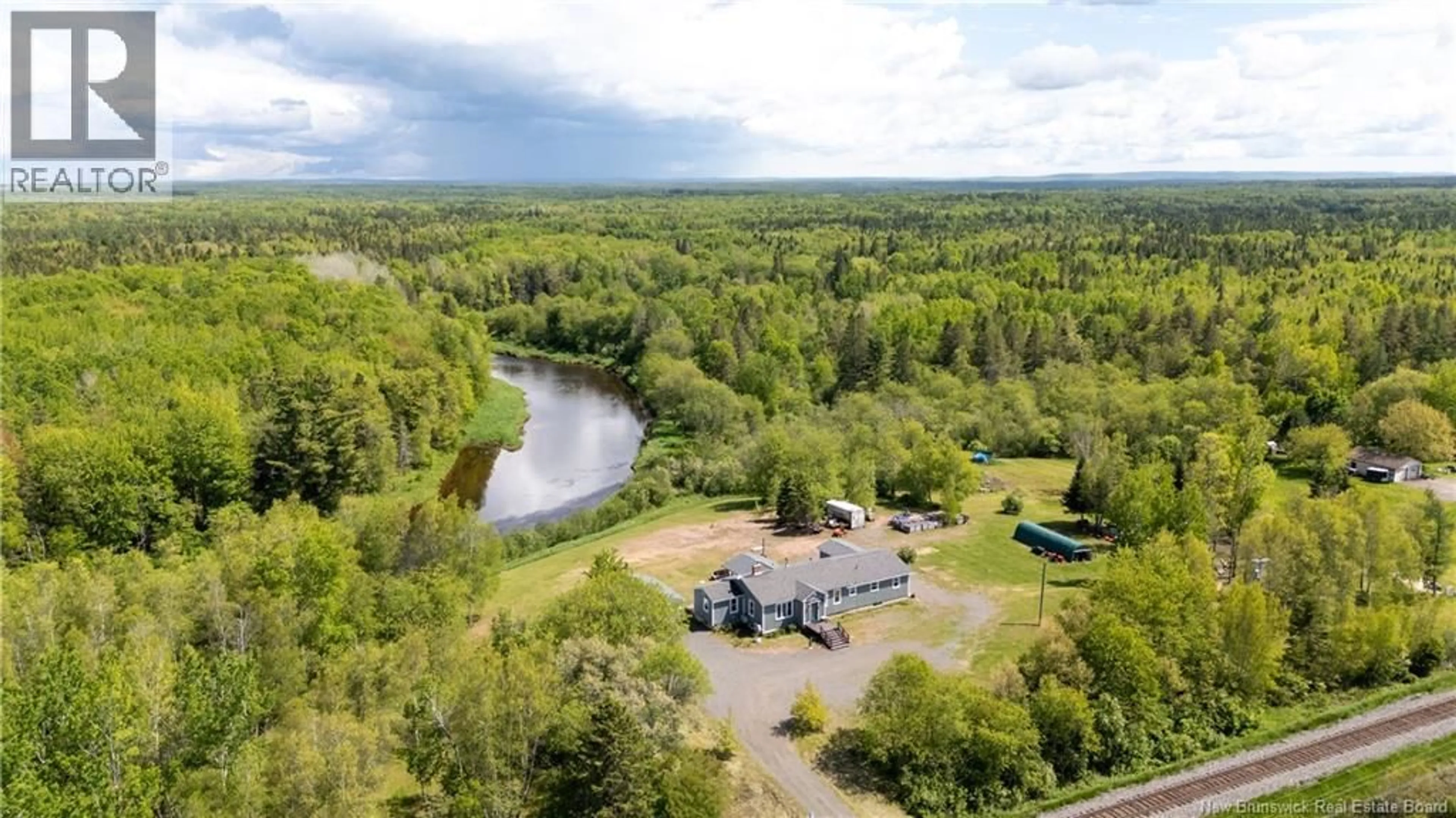A pic from outside/outdoor area/front of a property/back of a property/a pic from drone, water/lake/river/ocean view for 3854 ROUTE 106, River Glade New Brunswick E4Z6G2