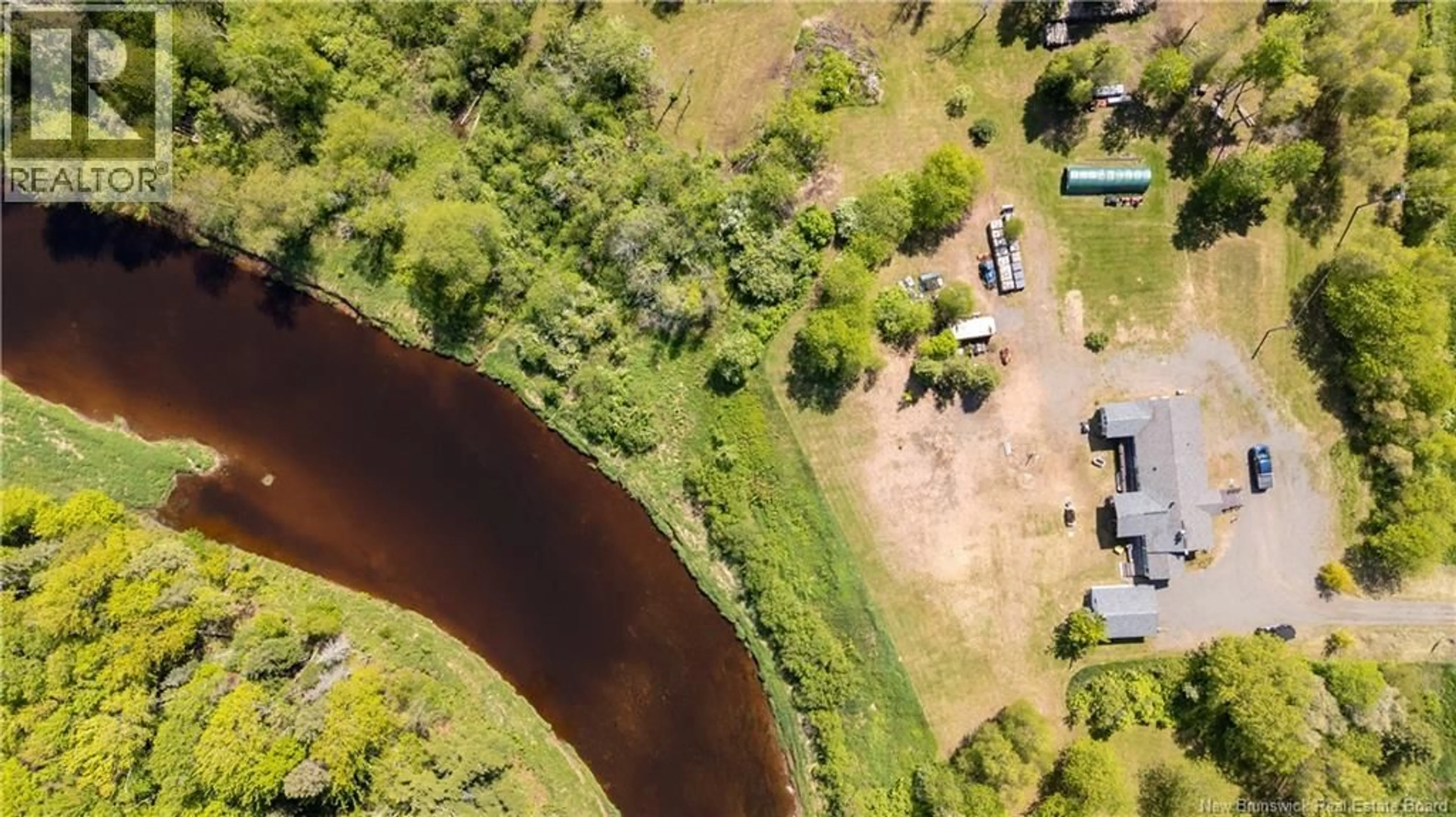 A pic from outside/outdoor area/front of a property/back of a property/a pic from drone, water/lake/river/ocean view for 3854 ROUTE 106, River Glade New Brunswick E4Z6G2