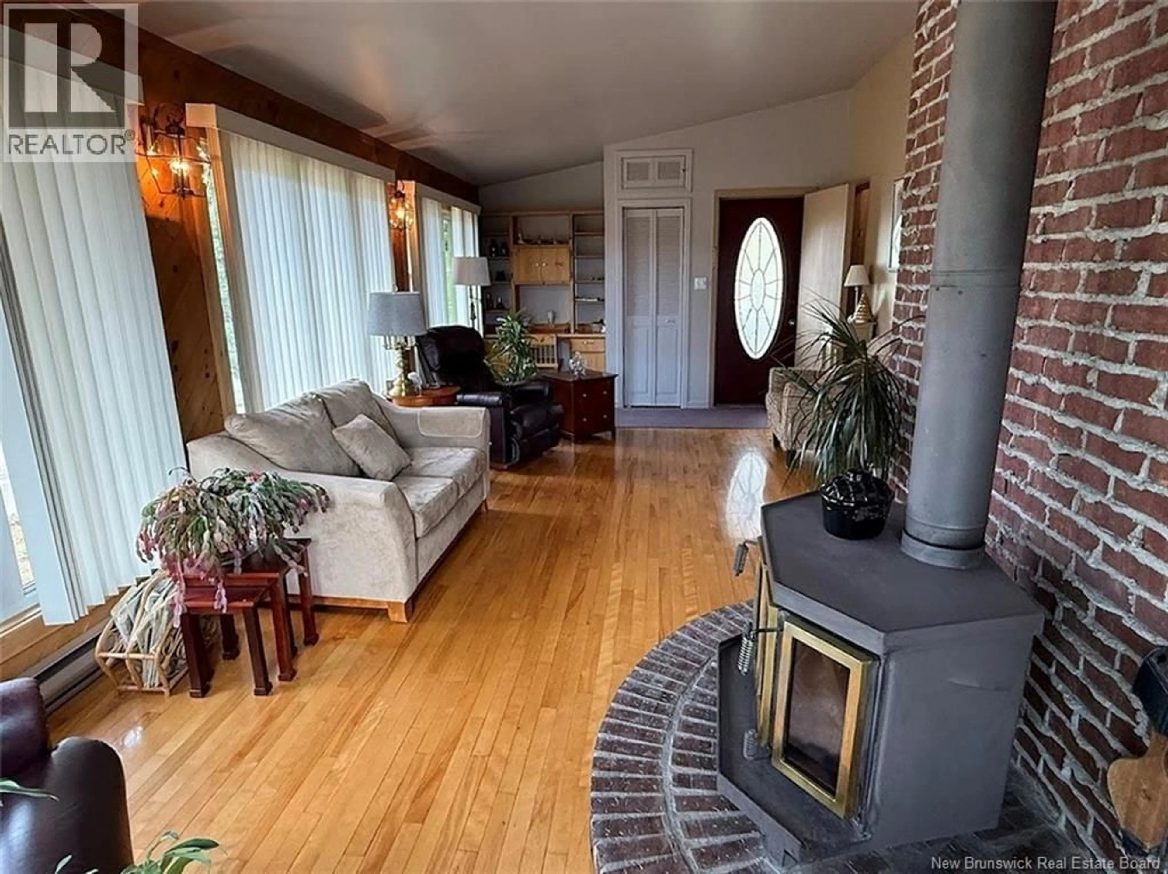 Living room with furniture, unknown for 40 GUERRETTE STREET, Edmundston New Brunswick E3V1N8