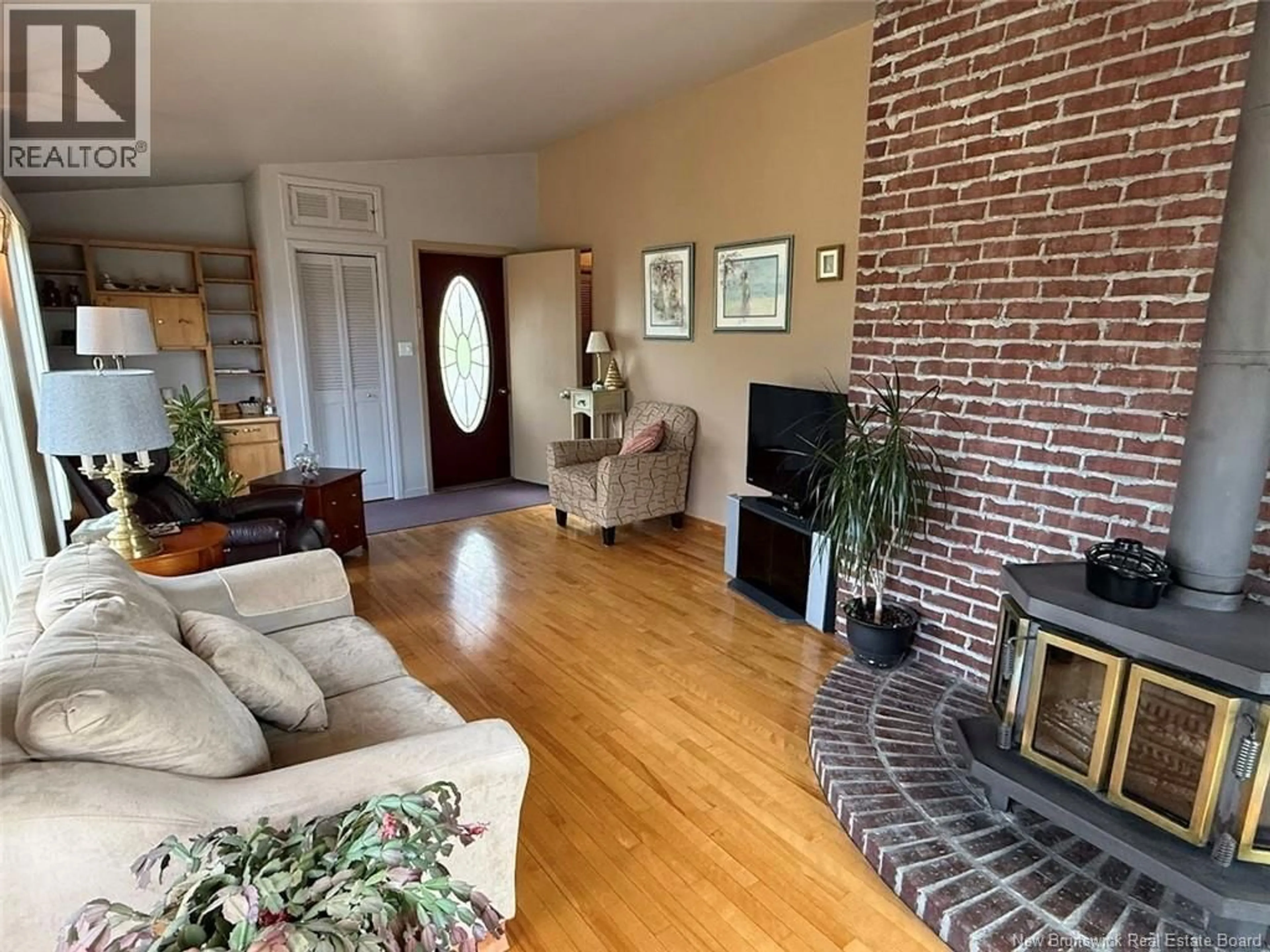Living room with furniture, unknown for 40 GUERRETTE STREET, Edmundston New Brunswick E3V1N8