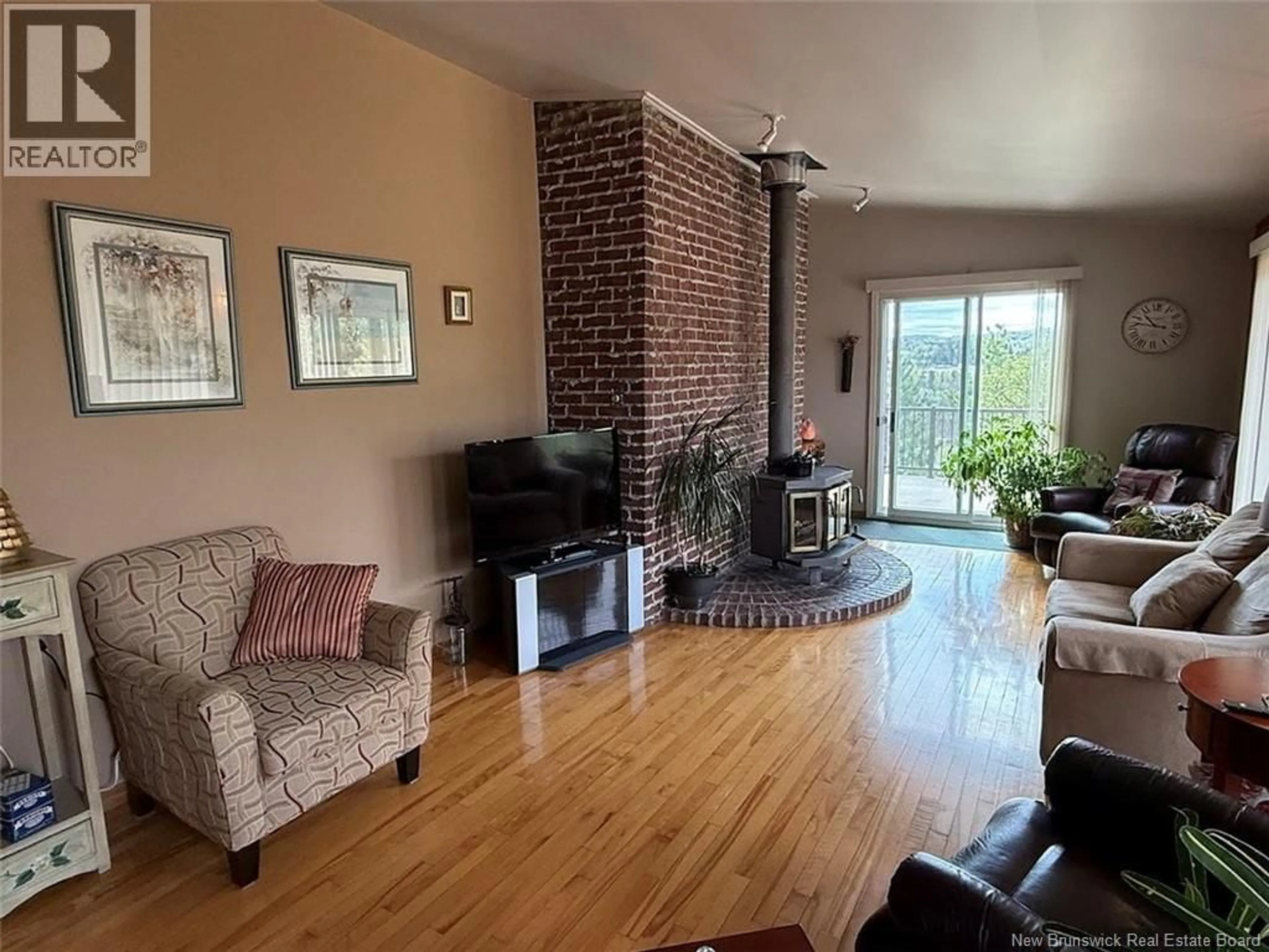 Living room with furniture, unknown for 40 GUERRETTE STREET, Edmundston New Brunswick E3V1N8