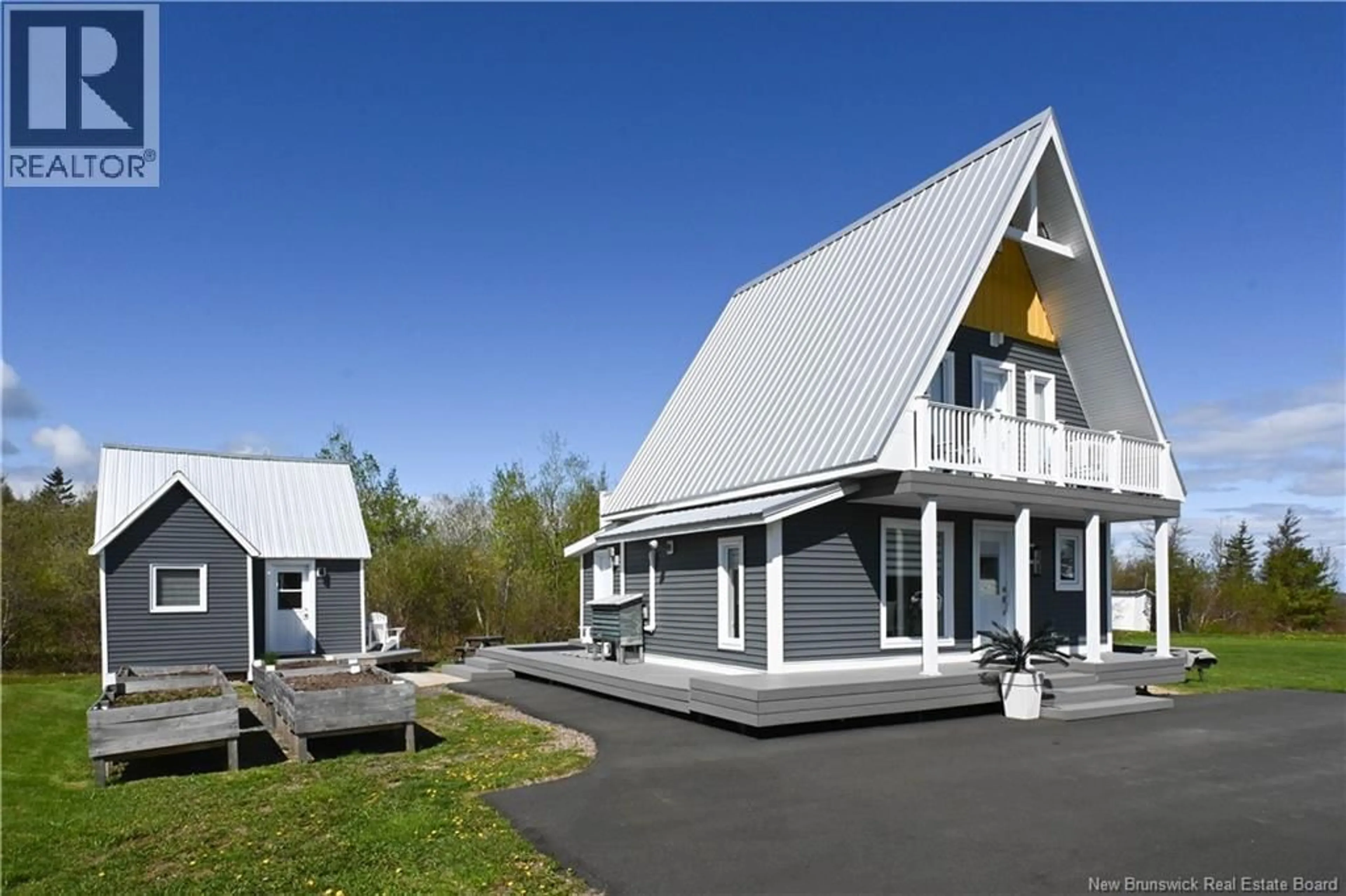 Home with vinyl exterior material, mountain view for 27 CHIASSON ROAD, Caraquet New Brunswick E1W1A3