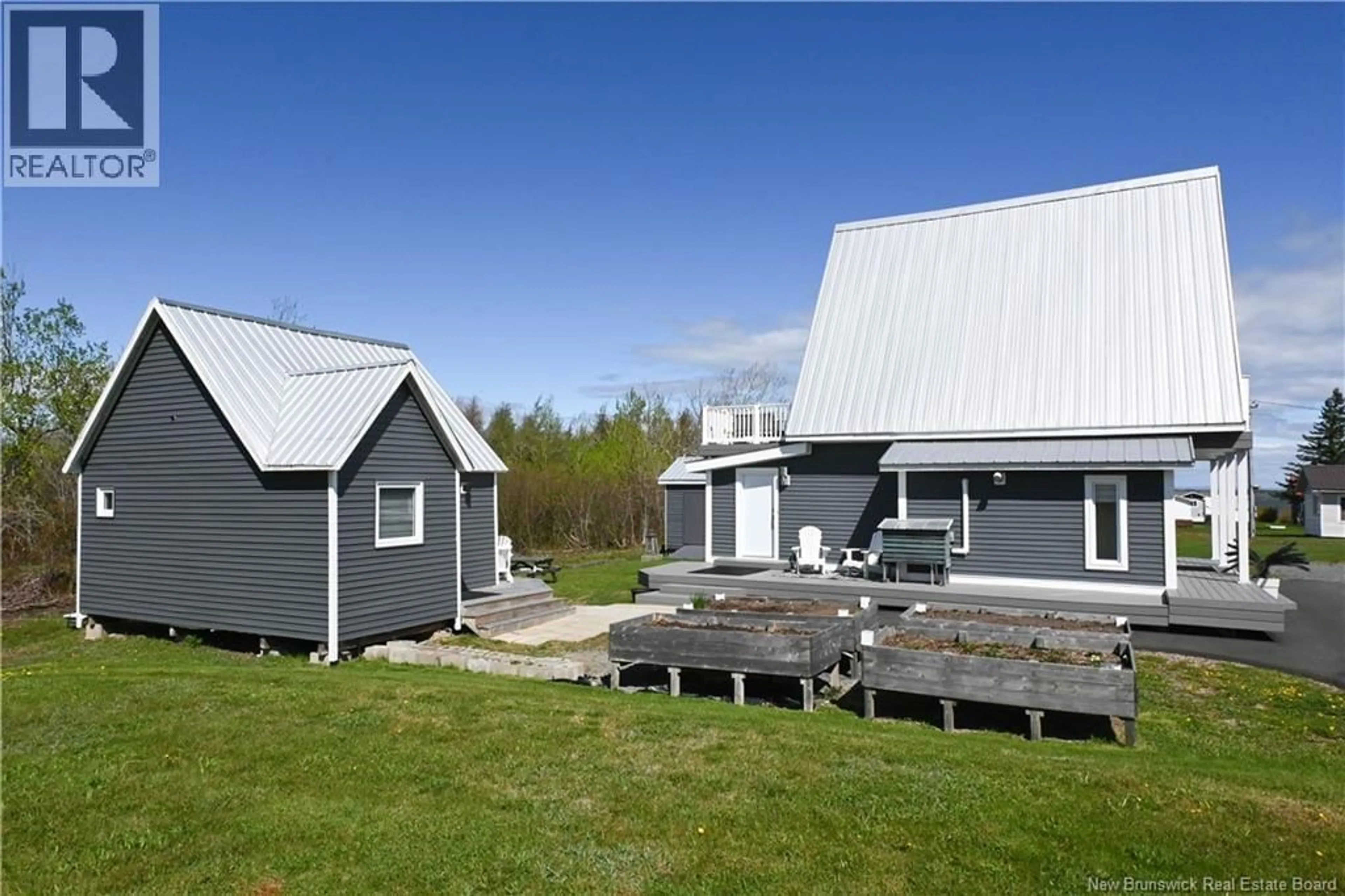A pic from outside/outdoor area/front of a property/back of a property/a pic from drone, unknown for 27 CHIASSON ROAD, Caraquet New Brunswick E1W1A3