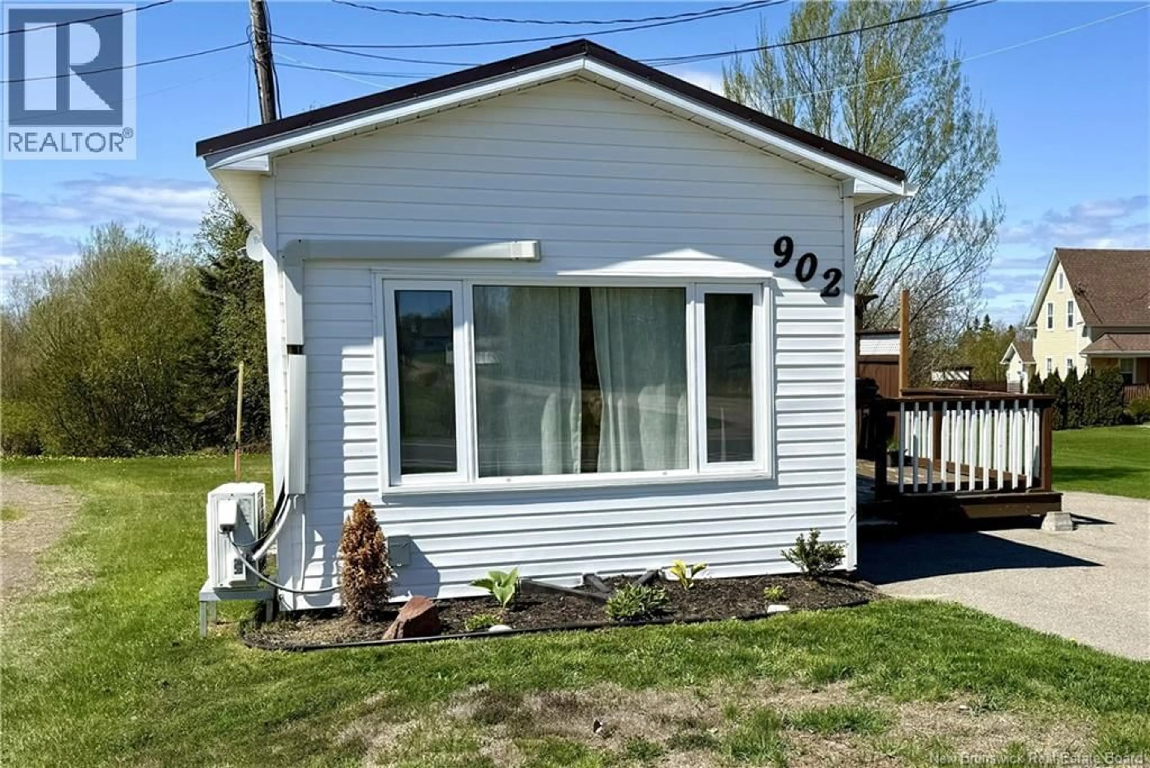 Home with vinyl exterior material, street for 902 BOULEVARD DES ACADIENS BOULEVARD, Bertrand New Brunswick E1W1H6