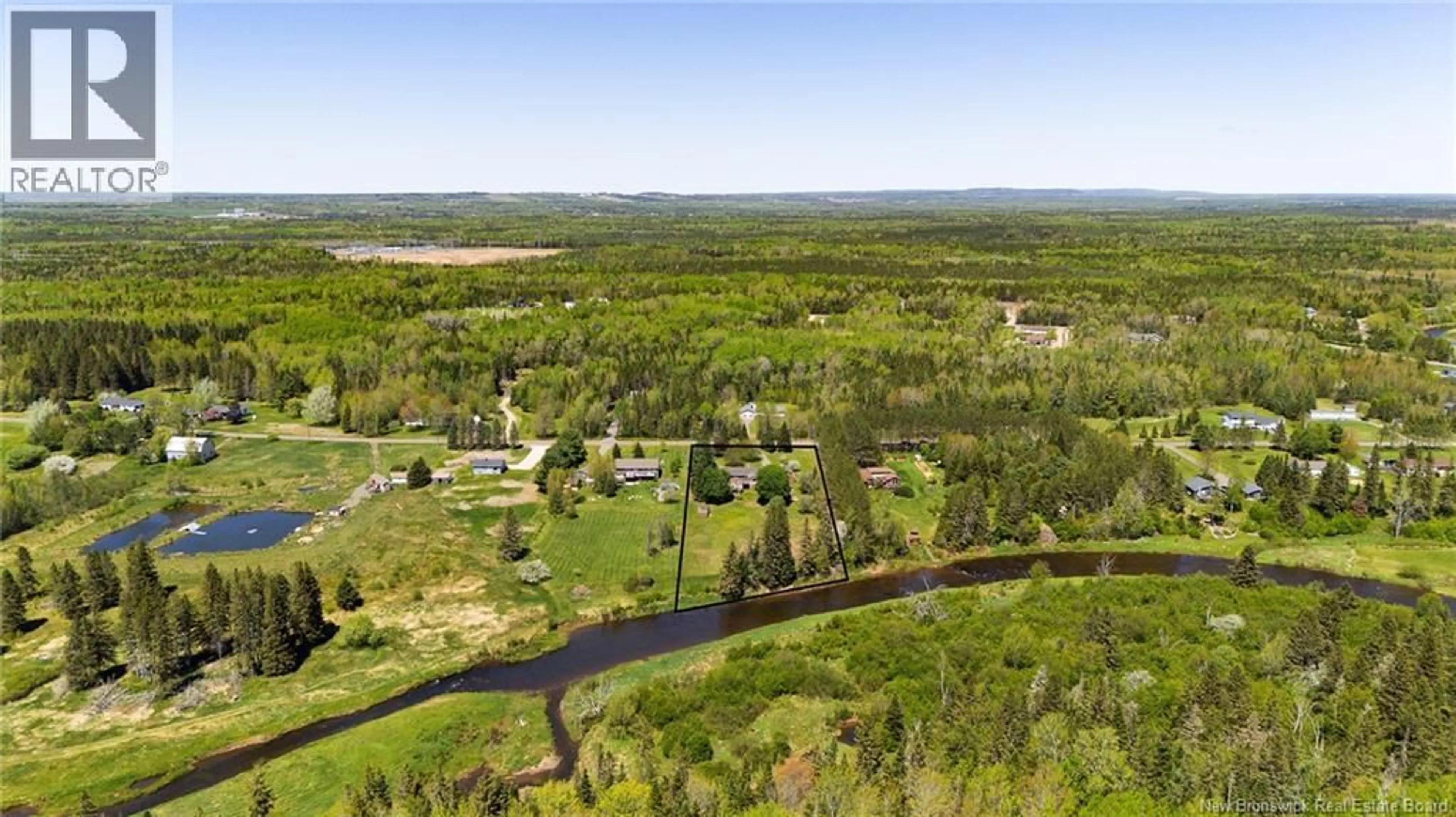 A pic from outside/outdoor area/front of a property/back of a property/a pic from drone, water/lake/river/ocean view for 295 MOLLINS ROAD, Colpitts Settlement New Brunswick E4J2X1