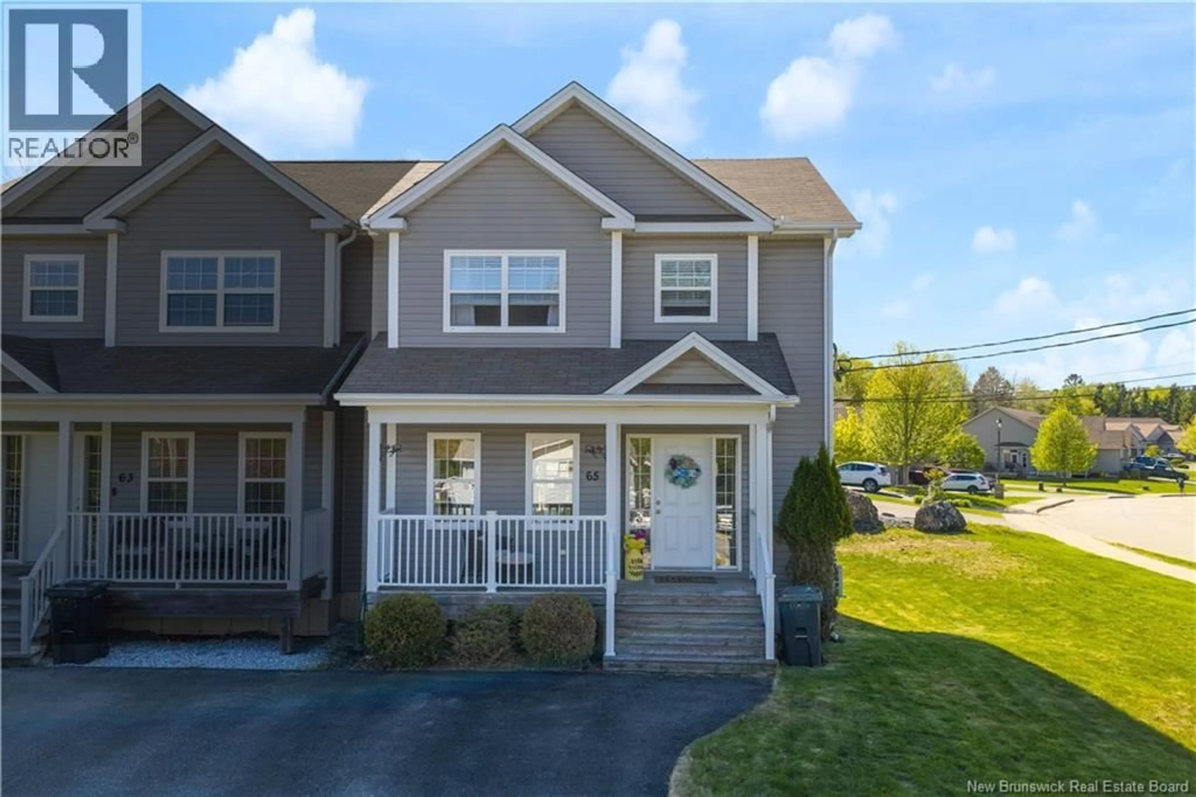 Home with vinyl exterior material, street for 65 PETTINGILL ROAD, Quispamsis New Brunswick E2E3R9