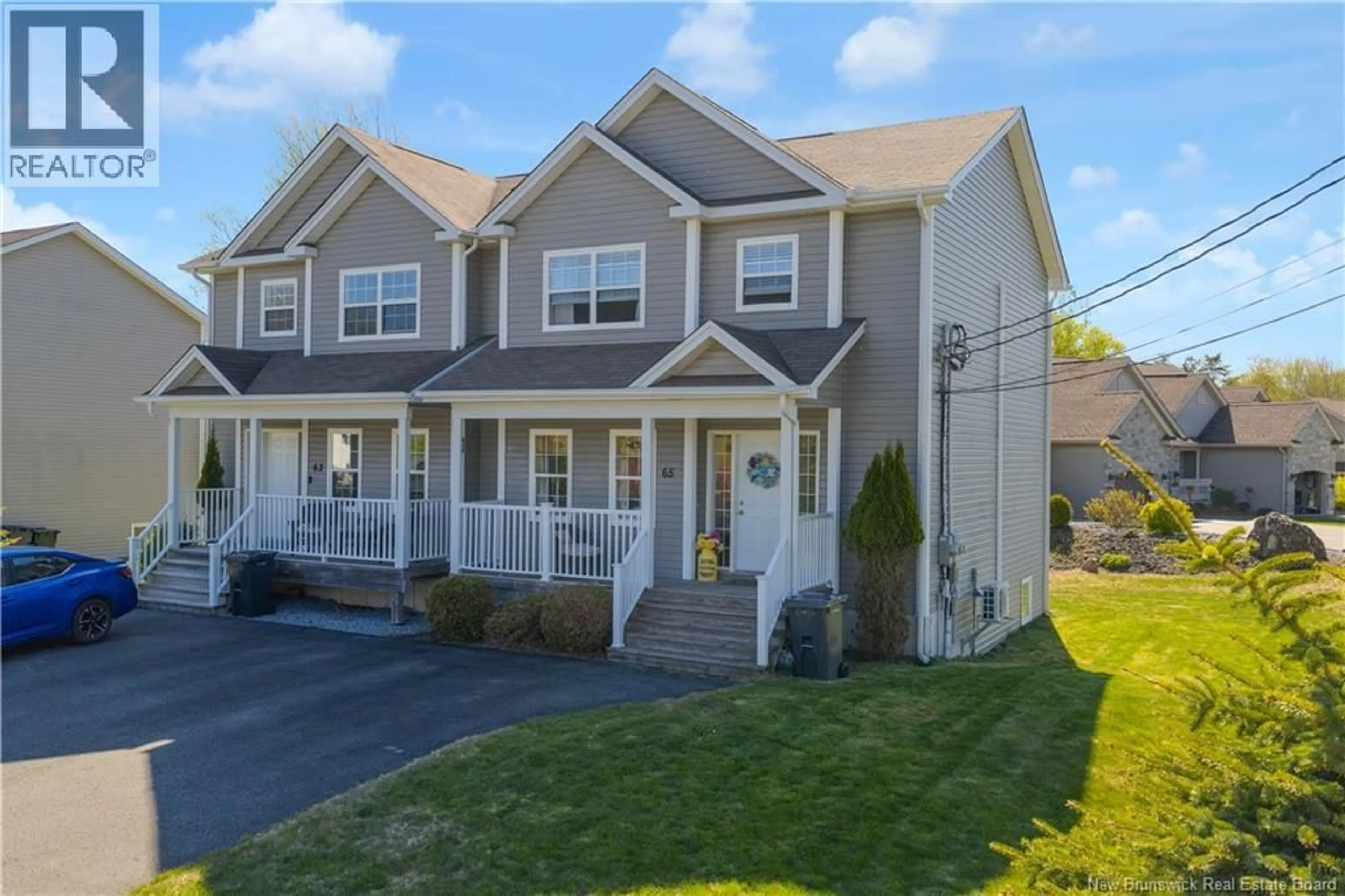 Home with vinyl exterior material, street for 65 PETTINGILL ROAD, Quispamsis New Brunswick E2E3R9