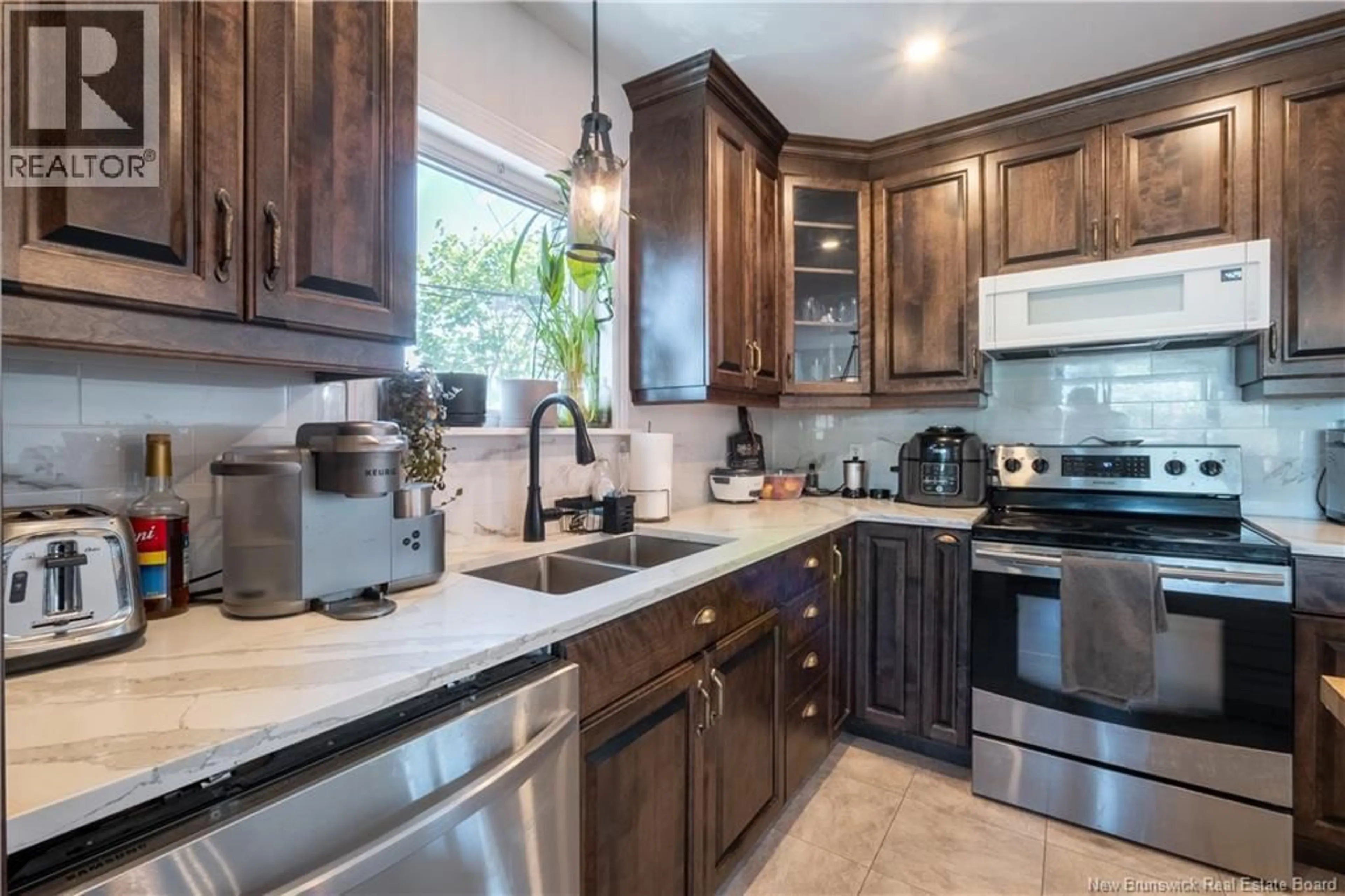 Open concept kitchen, ceramic/tile floor for 10 HOPPER STREET, Moncton New Brunswick E1C8Y5