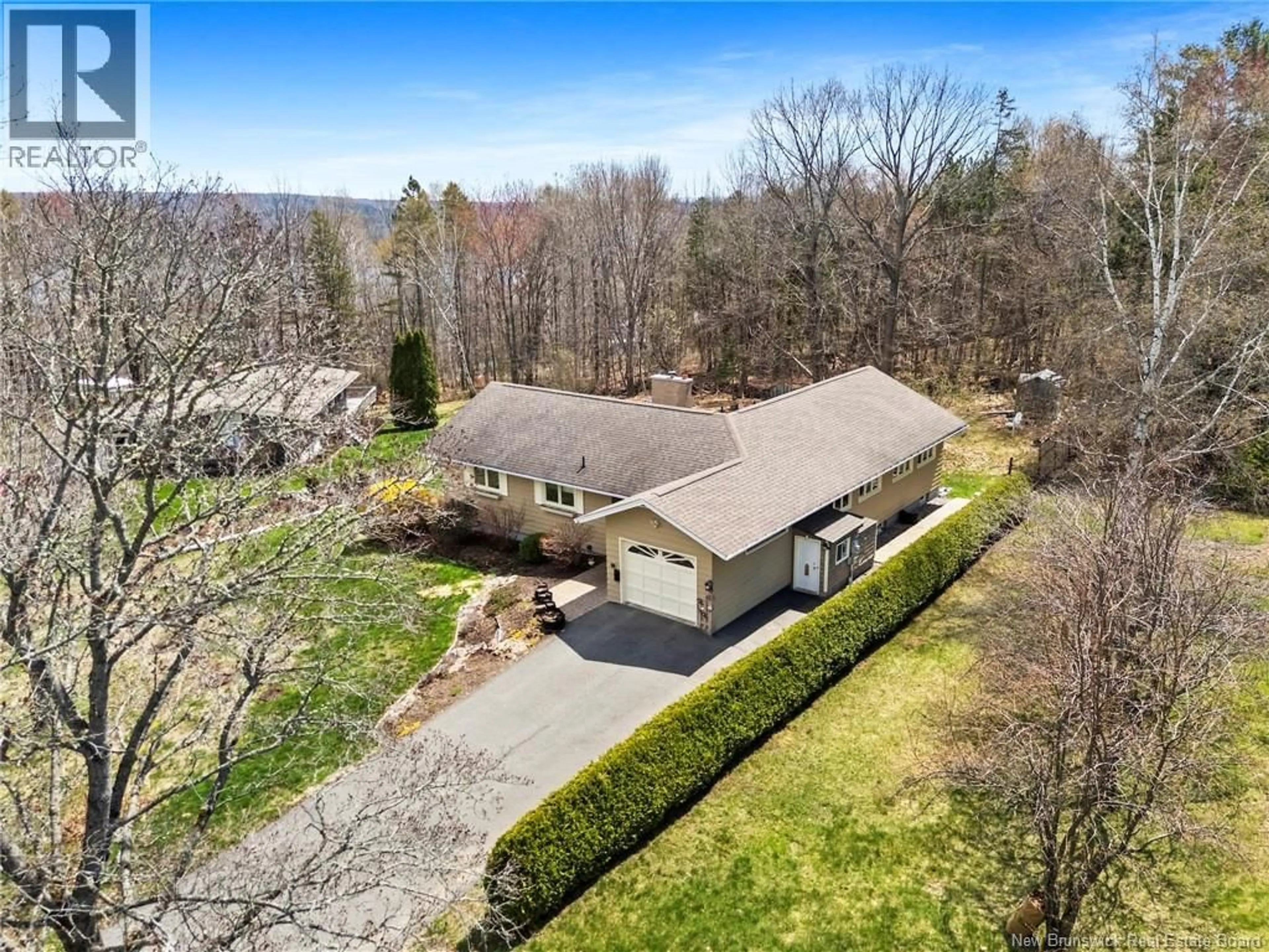 A pic from outside/outdoor area/front of a property/back of a property/a pic from drone, unknown for 19 FOREST ACRES COURT, Fredericton New Brunswick E3B4C2