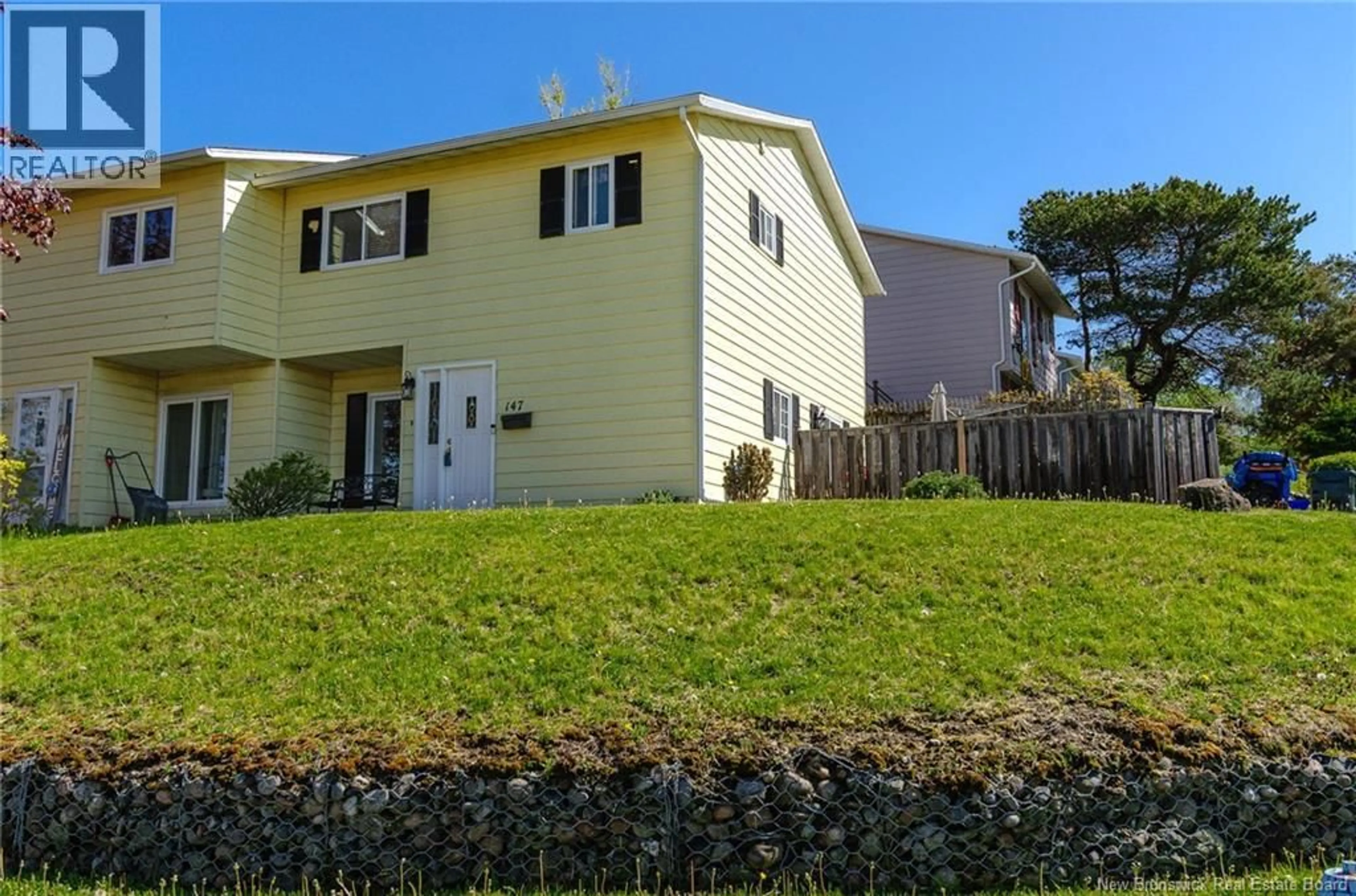 A pic from outside/outdoor area/front of a property/back of a property/a pic from drone, water/lake/river/ocean view for 147 WOODHAVEN DRIVE, Saint John New Brunswick E2K4M3