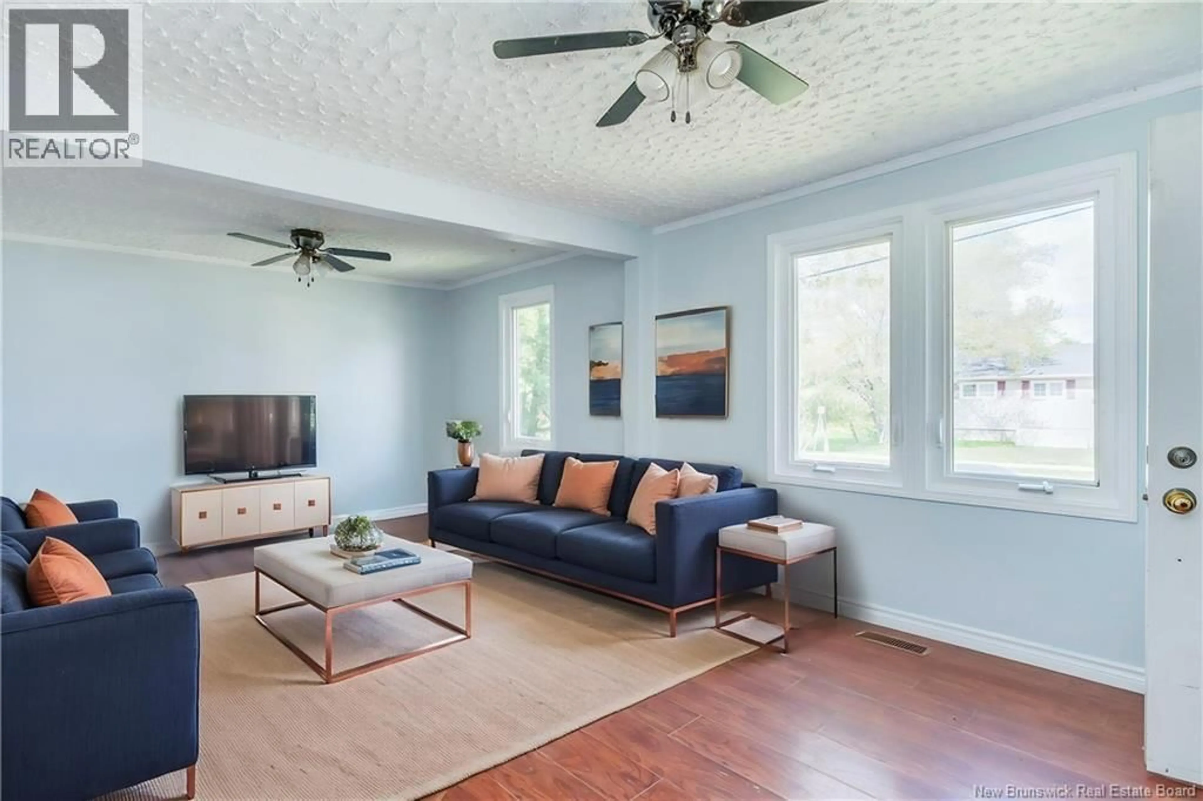 Living room with furniture, wood/laminate floor for 150 PURDY AVENUE, Moncton New Brunswick E1C7W2