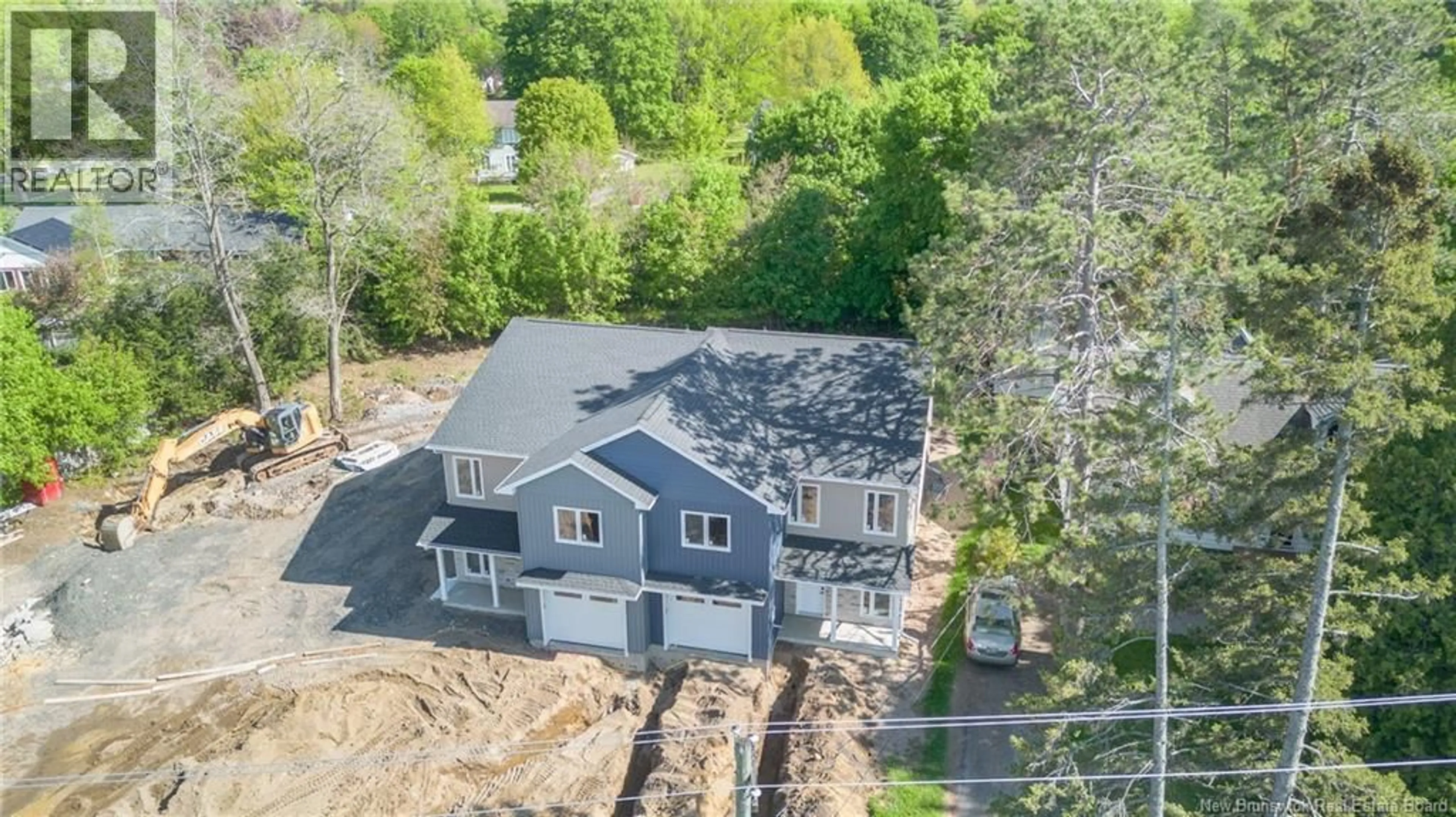 A pic from outside/outdoor area/front of a property/back of a property/a pic from drone, unknown for B - 378 WOODSTOCK ROAD, Fredericton New Brunswick E3B2H7