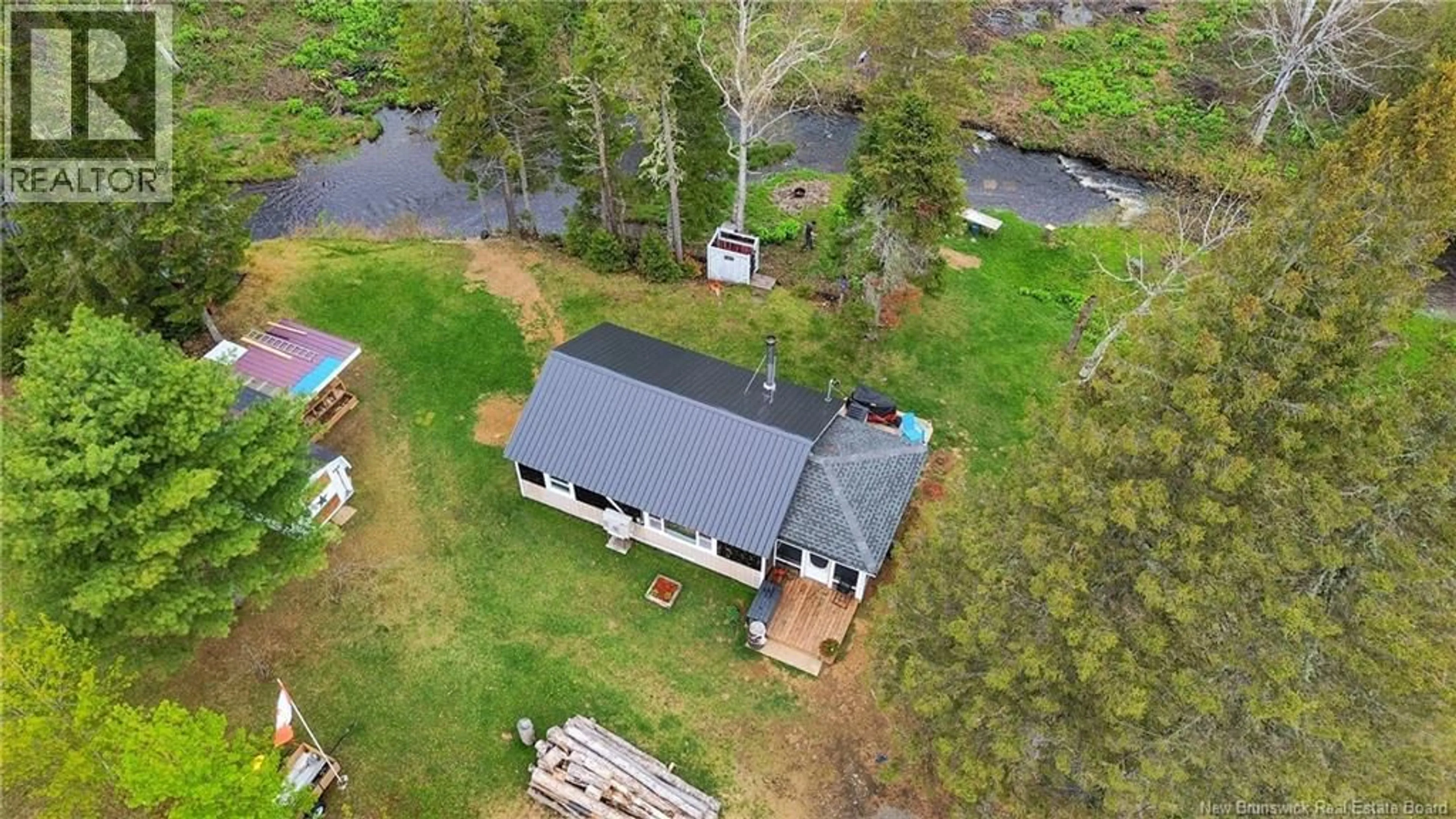A pic from outside/outdoor area/front of a property/back of a property/a pic from drone, water/lake/river/ocean view for 15 NORTH RIDGE ROAD, Foreston New Brunswick E7L1K4