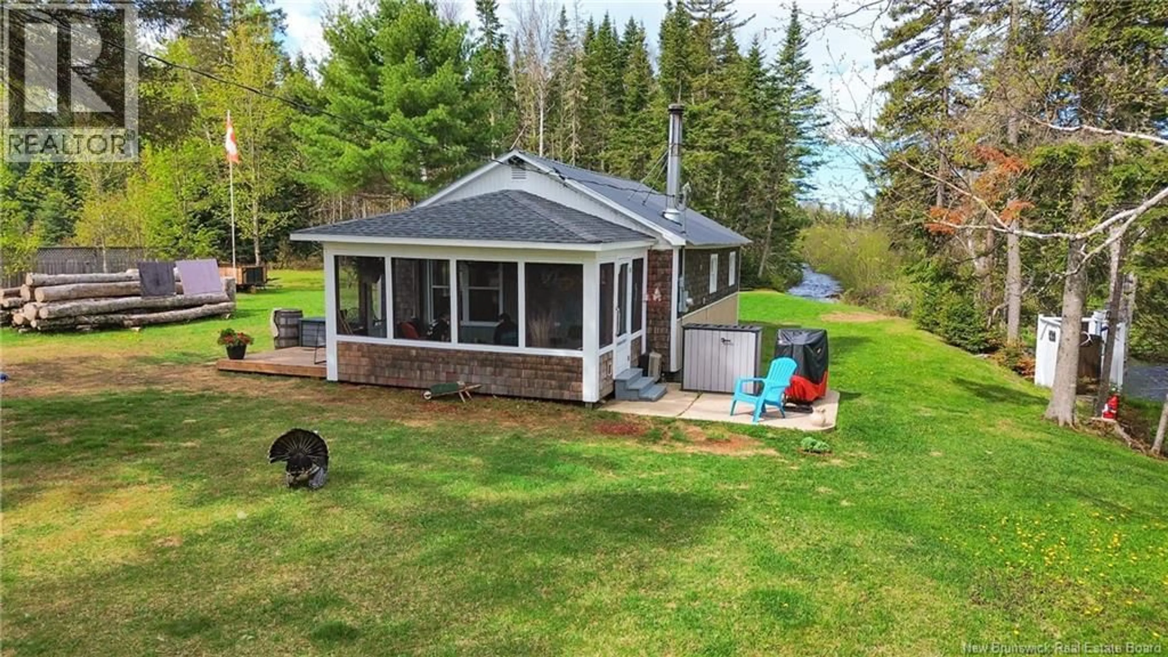 A pic from outside/outdoor area/front of a property/back of a property/a pic from drone, water/lake/river/ocean view for 15 NORTH RIDGE ROAD, Foreston New Brunswick E7L1K4