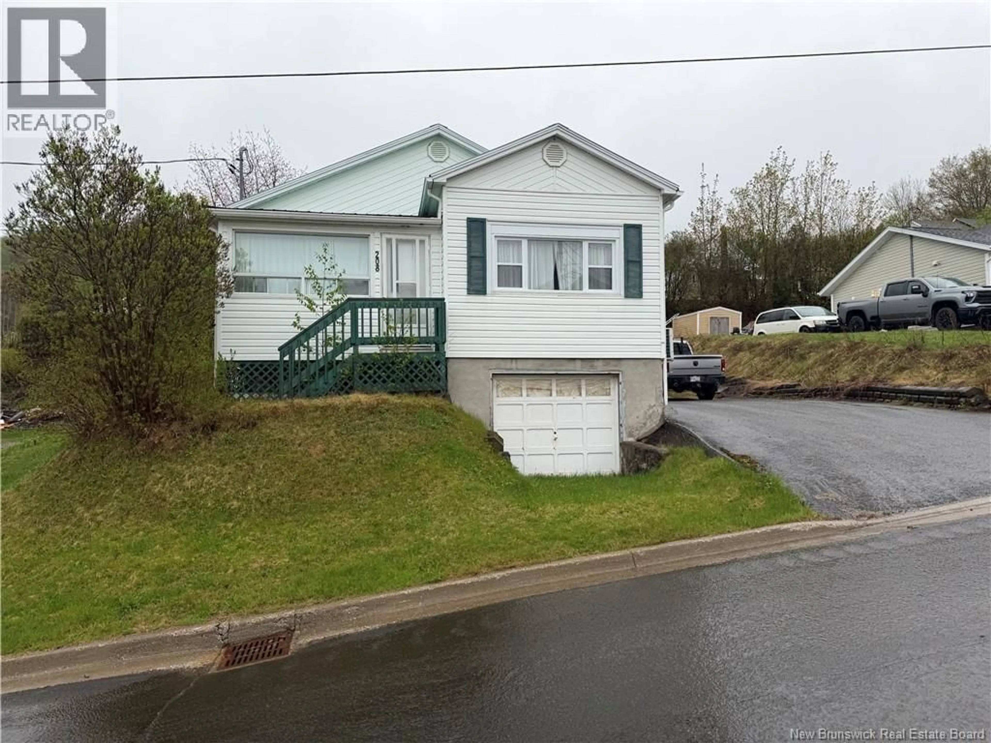 Home with vinyl exterior material, street for 208 FERGUSON STREET, Atholville New Brunswick E3N4P4