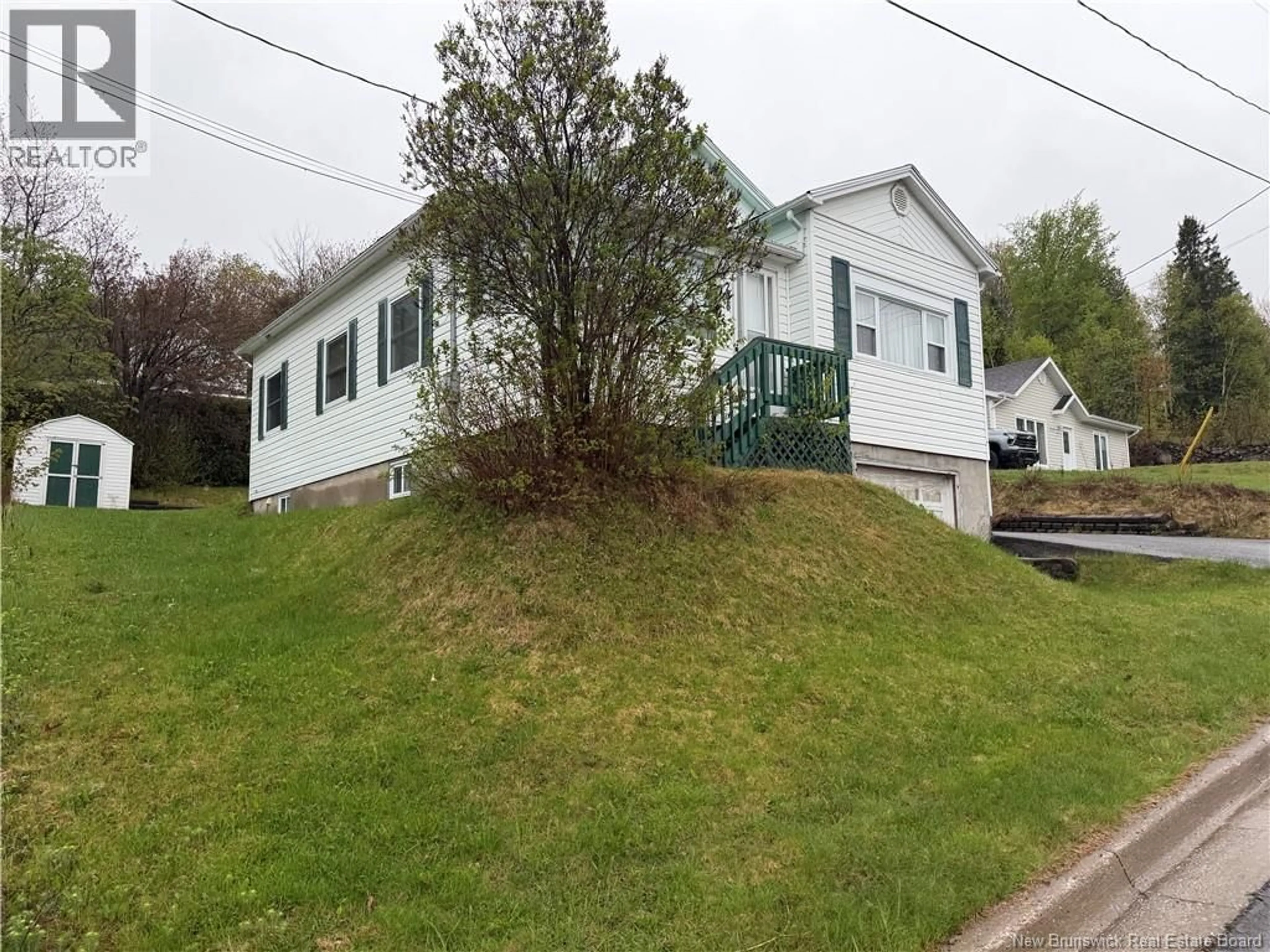 A pic from outside/outdoor area/front of a property/back of a property/a pic from drone, unknown for 208 FERGUSON STREET, Atholville New Brunswick E3N4P4