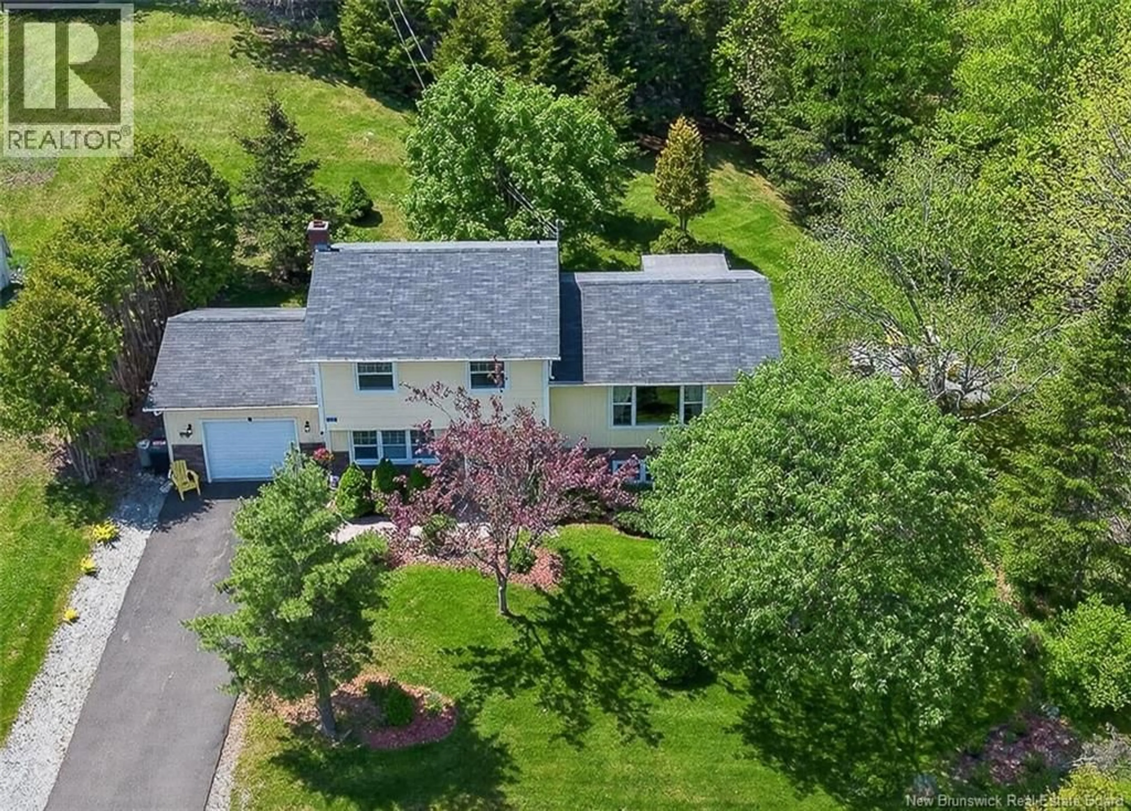 A pic from outside/outdoor area/front of a property/back of a property/a pic from drone, street for 112 DONCASTER DRIVE, Quispamsis New Brunswick E2E1R2