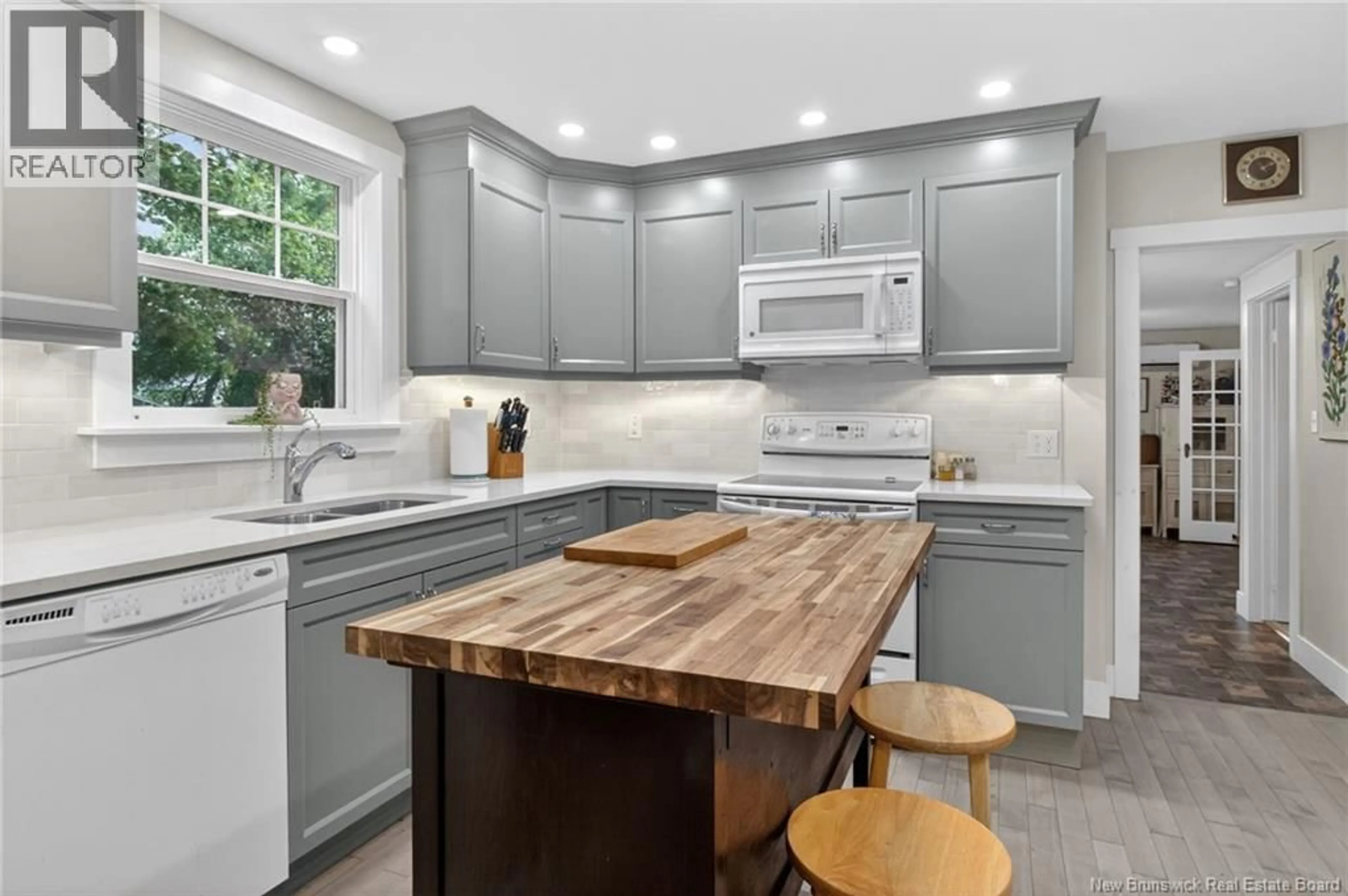 Open concept kitchen, wood/laminate floor for 1236 POST ROAD, Sussex Corner New Brunswick E4E2V5
