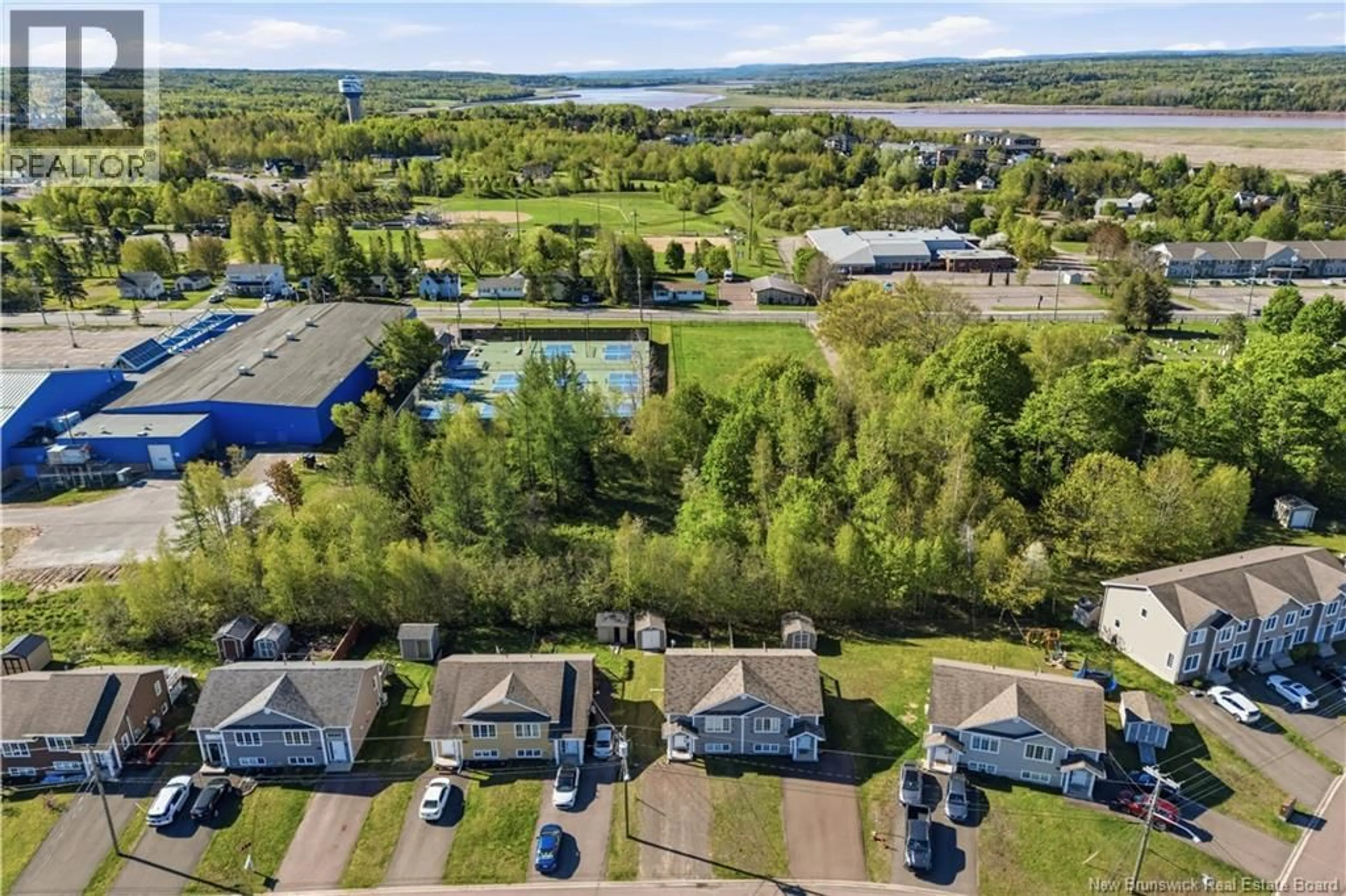 A pic from outside/outdoor area/front of a property/back of a property/a pic from drone, water/lake/river/ocean view for 899 BERNARD ST, Dieppe New Brunswick E1A4S6