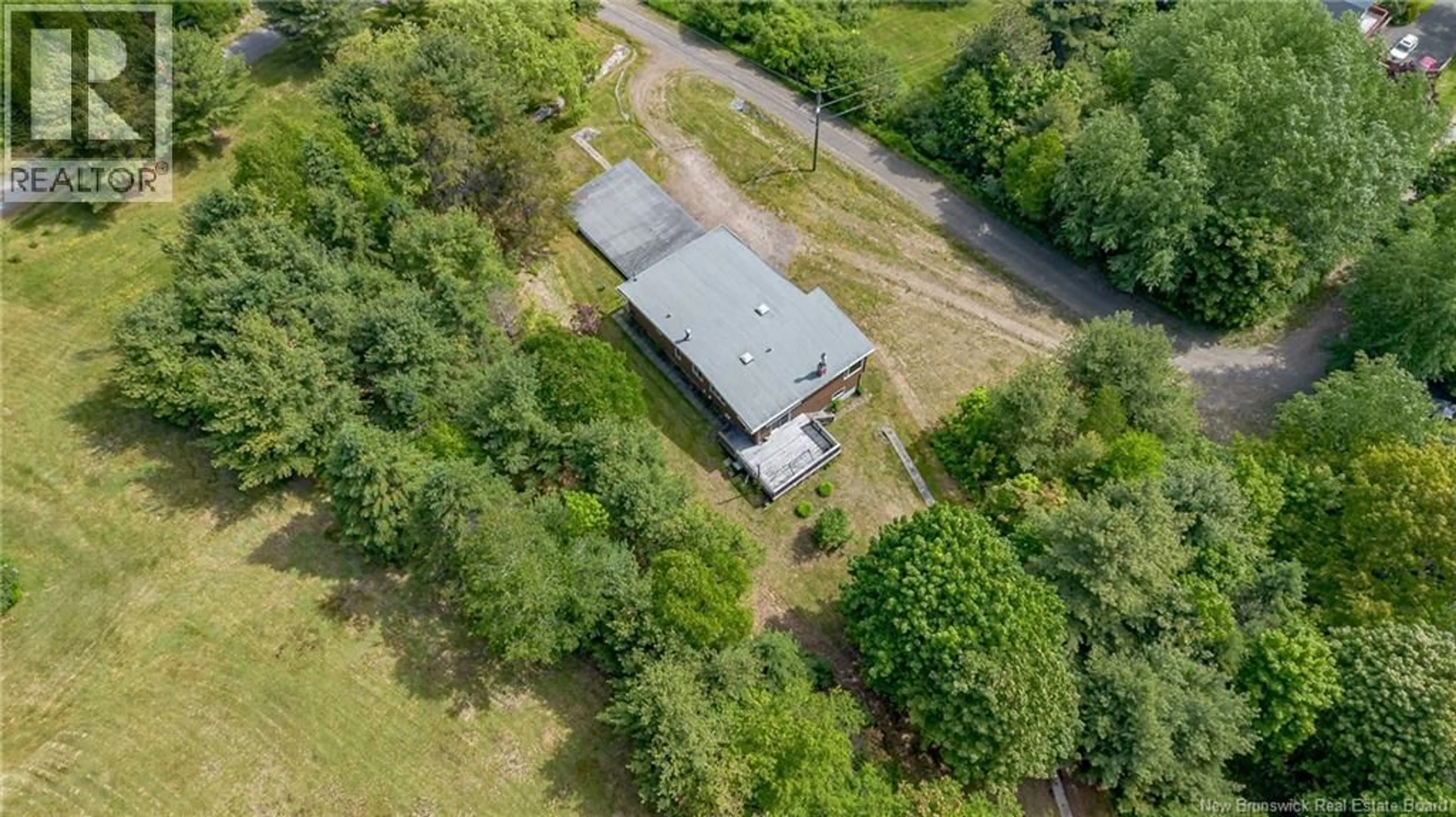 A pic from outside/outdoor area/front of a property/back of a property/a pic from drone, building for 23 EDGEWOOD LANE, Grand Bay-Westfield New Brunswick E5K3G6