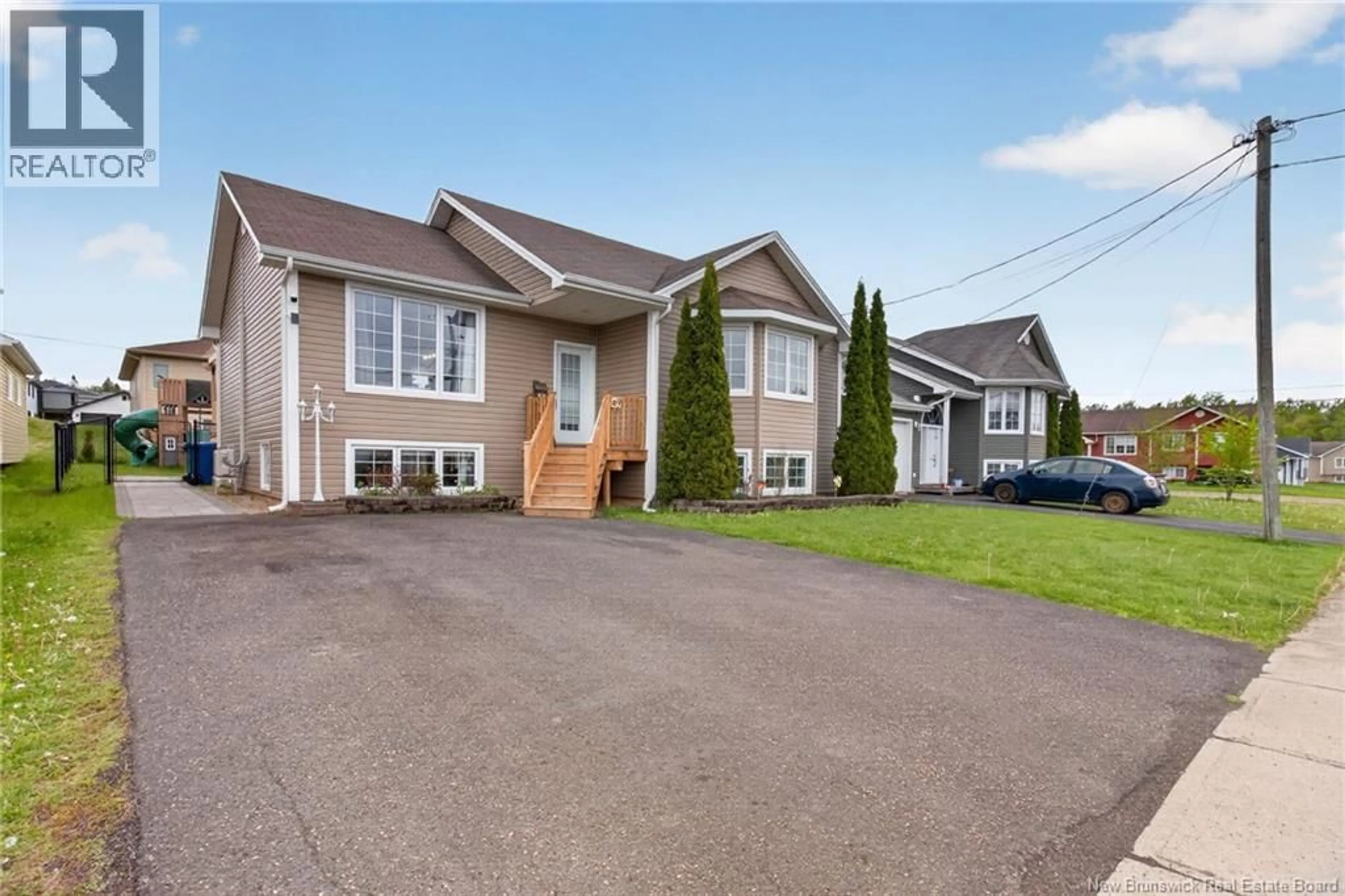 Home with vinyl exterior material, street for 9 MONIQUE STREET, Moncton New Brunswick E1G0R3
