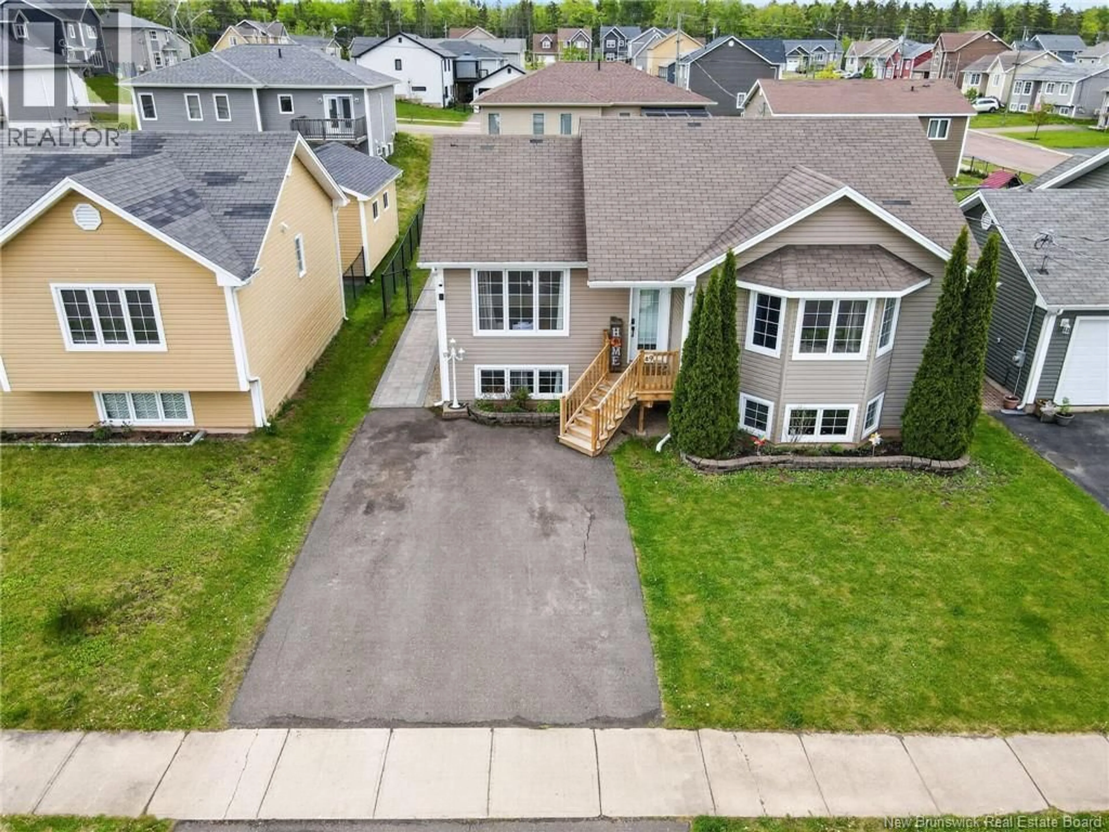 A pic from outside/outdoor area/front of a property/back of a property/a pic from drone, street for 9 MONIQUE STREET, Moncton New Brunswick E1G0R3