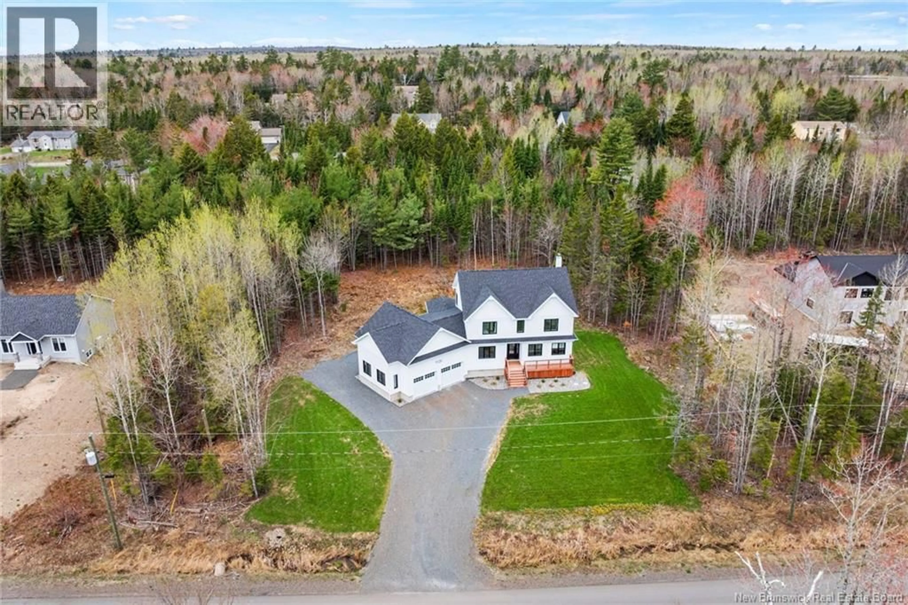 A pic from outside/outdoor area/front of a property/back of a property/a pic from drone, unknown for 26 CALEAH LANE, Hanwell New Brunswick E3C0P9