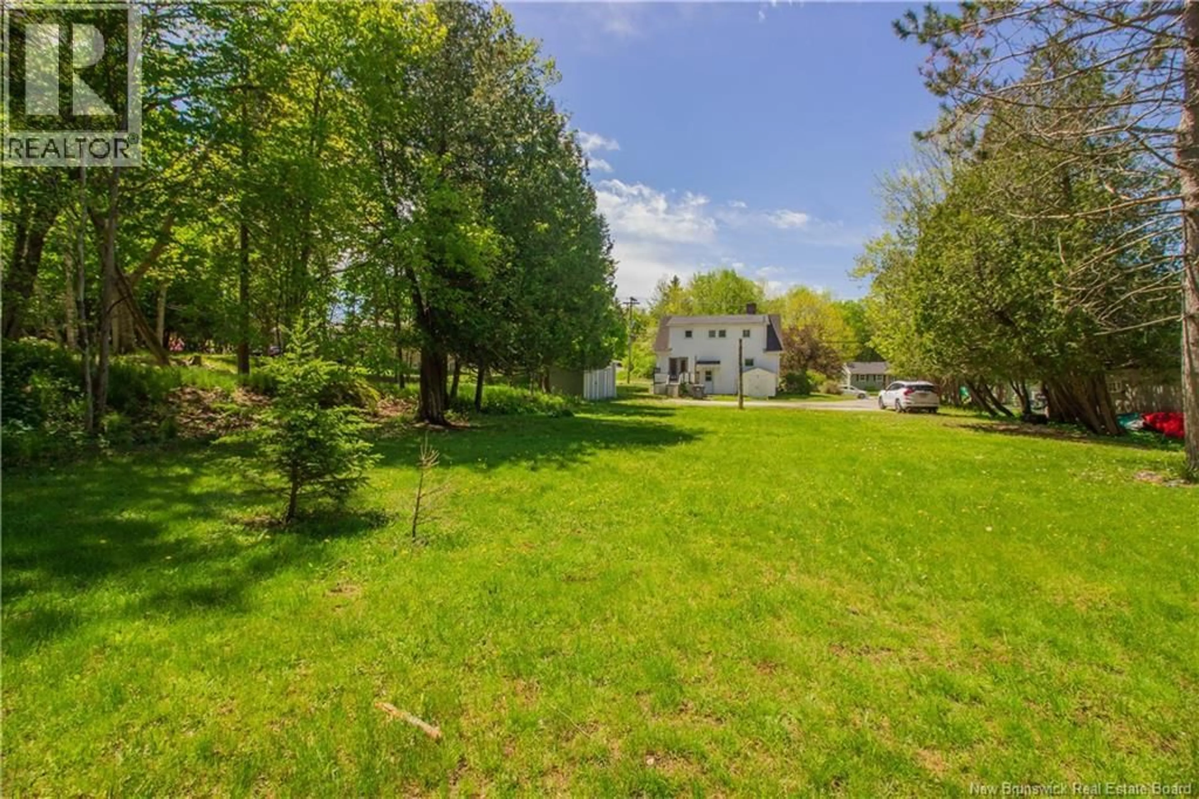 A pic from outside/outdoor area/front of a property/back of a property/a pic from drone, forest/trees view for 970 MAIN STREET, Hampton New Brunswick E5N6E7