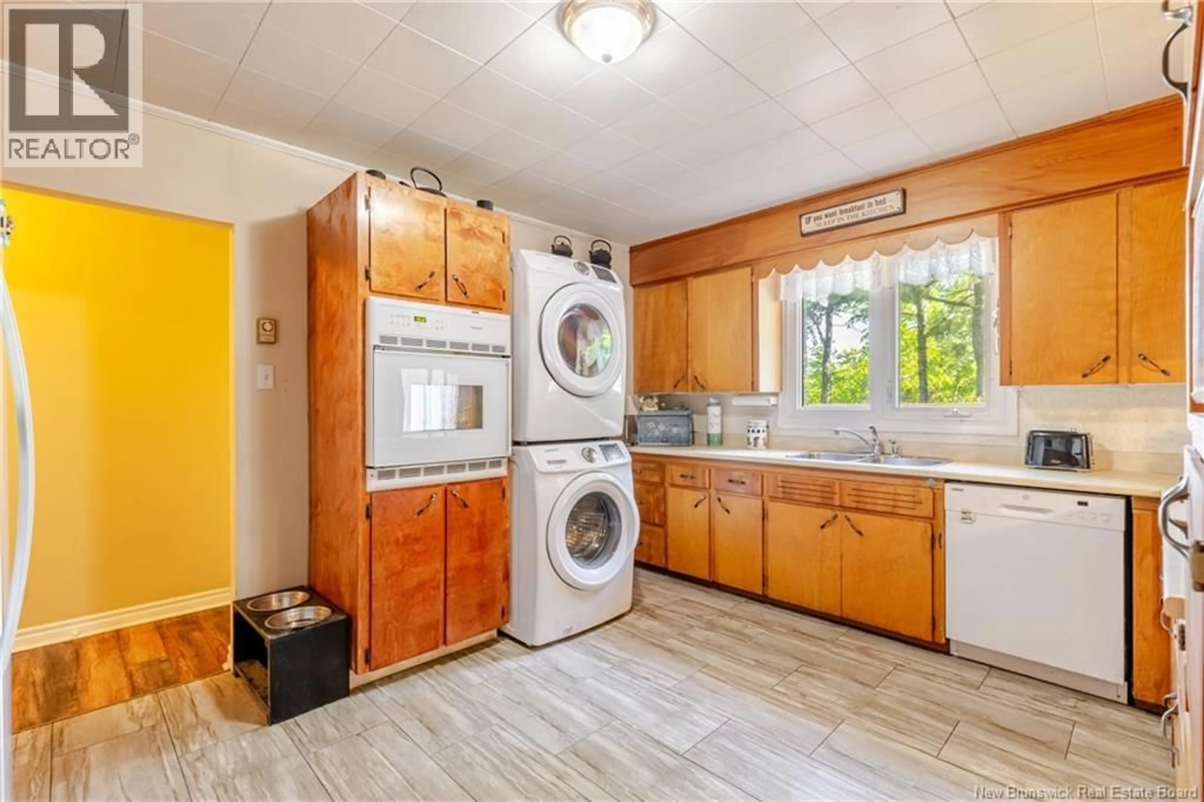 Kitchen with laundary machines, unknown for 727 GREGG COURT, Fredericton New Brunswick E3B4H5