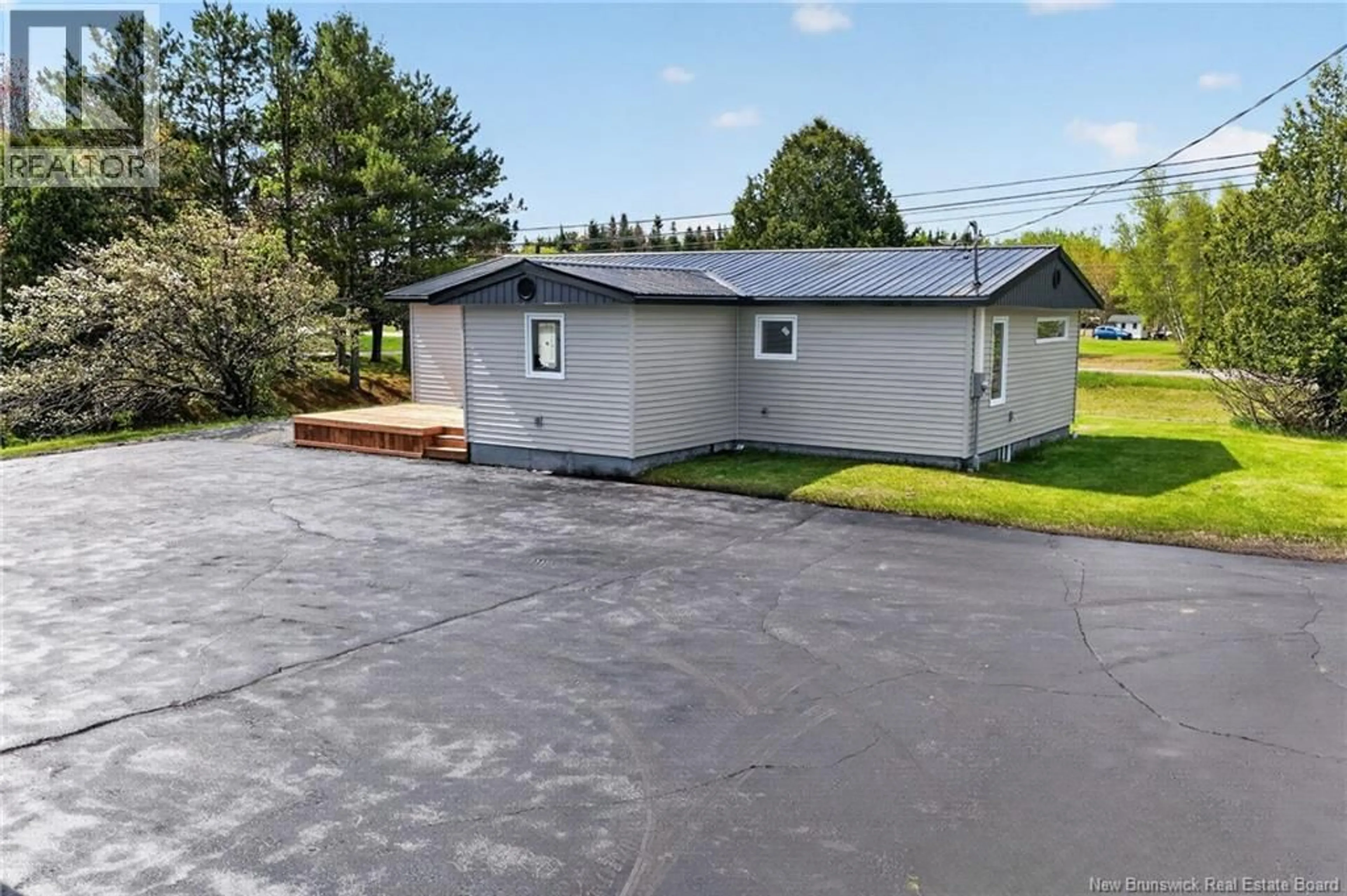 A pic from outside/outdoor area/front of a property/back of a property/a pic from drone, unknown for 4 CHEMIN POINTE DE L'EGLISE, Aldouane New Brunswick E4W5H2