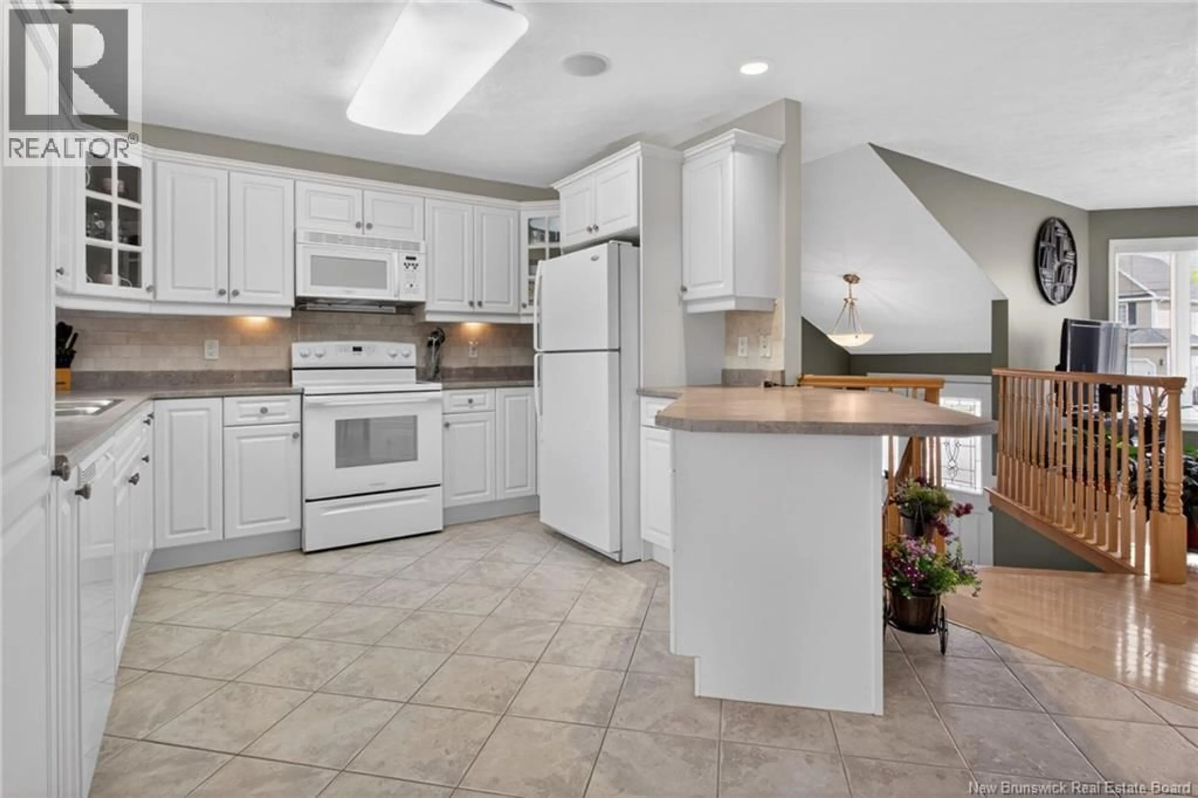 Open concept kitchen, ceramic/tile floor for 36 LABELLE, Moncton New Brunswick E1G4V4
