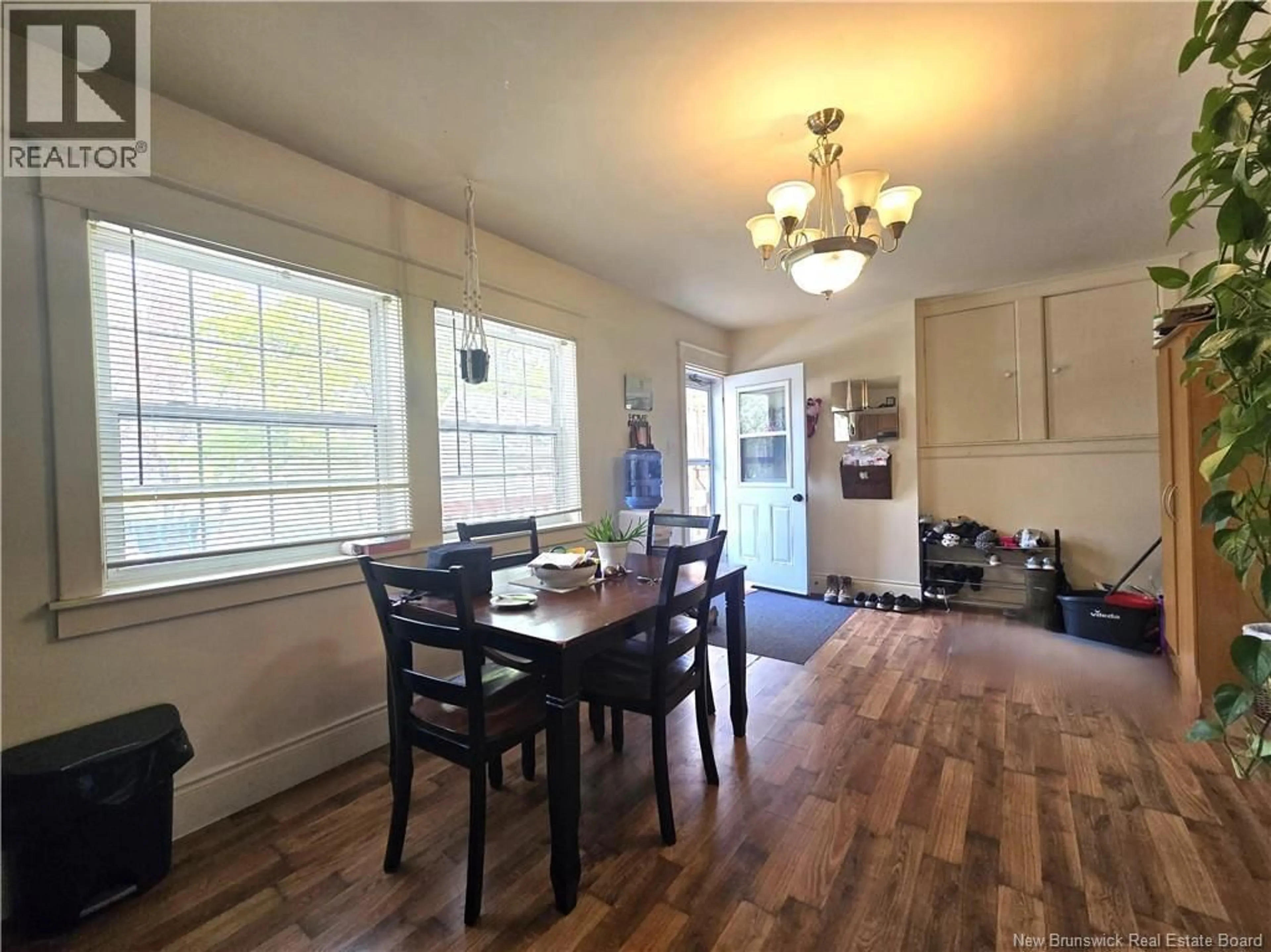 Dining room, wood/laminate floor for 3560 RUE PRINCIPALE, Tracadie New Brunswick E1X1C9