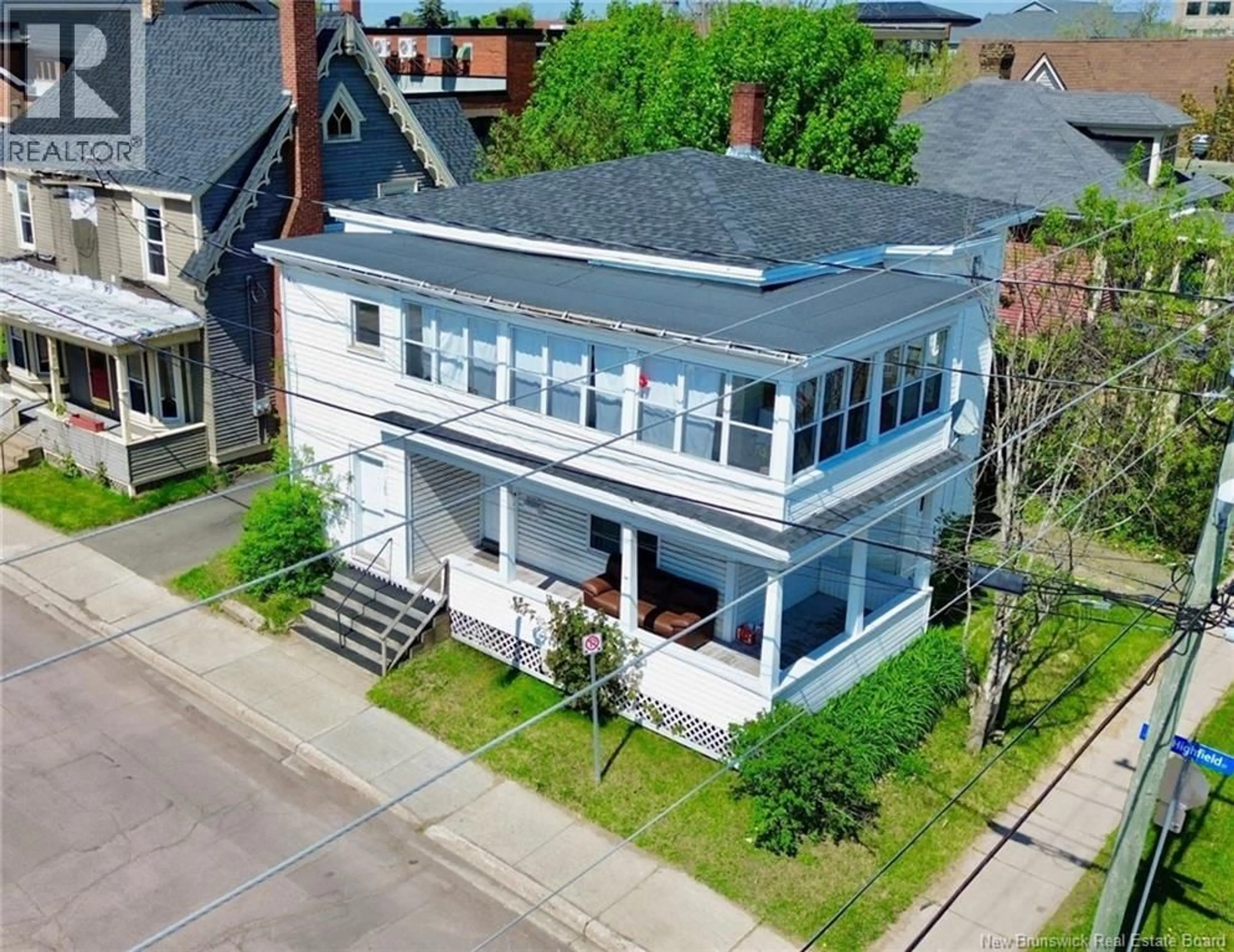 A pic from outside/outdoor area/front of a property/back of a property/a pic from drone, building for 107-109 HIGHFIELD, Moncton New Brunswick E1C5N6