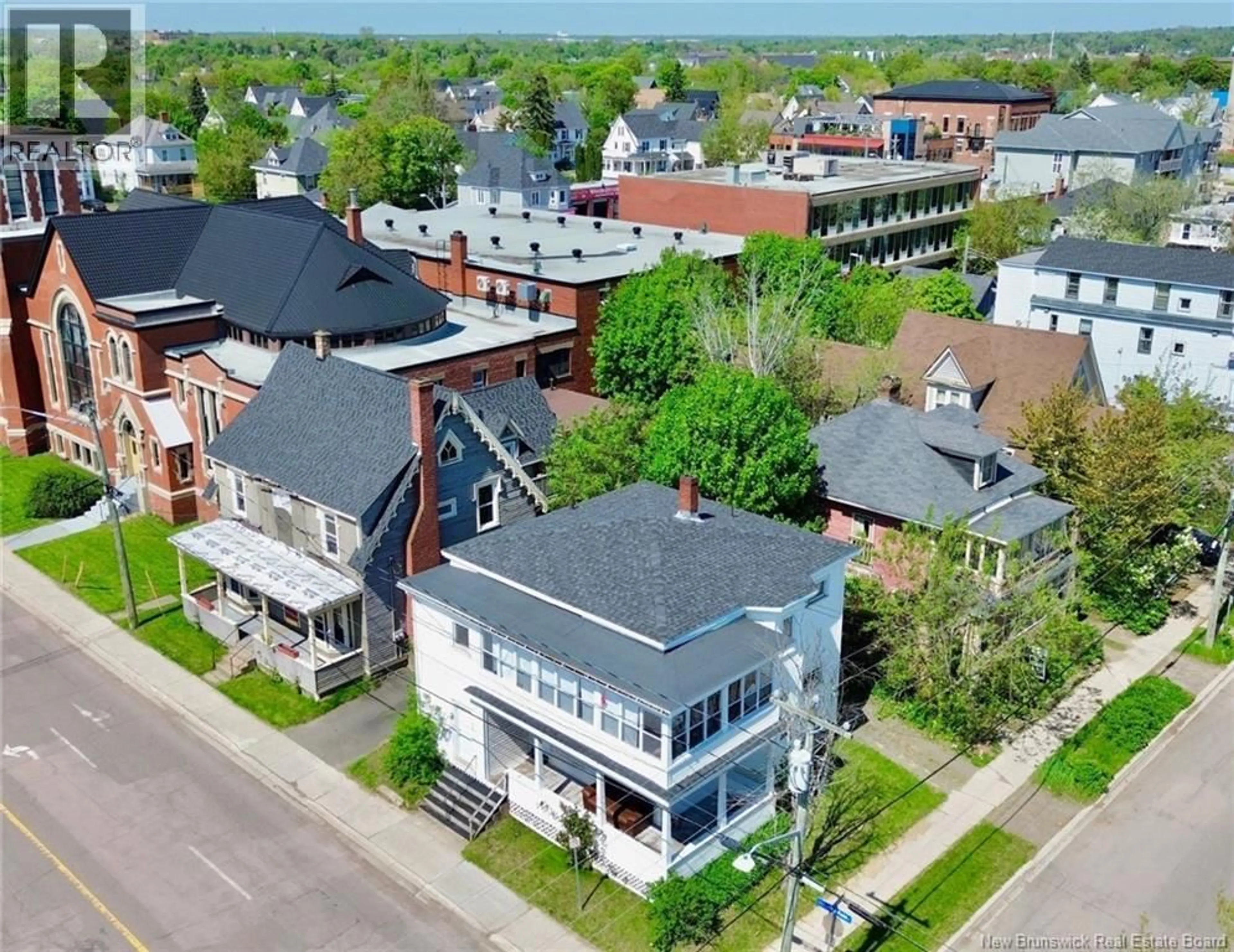 A pic from outside/outdoor area/front of a property/back of a property/a pic from drone, street for 107-109 HIGHFIELD, Moncton New Brunswick E1C5N6