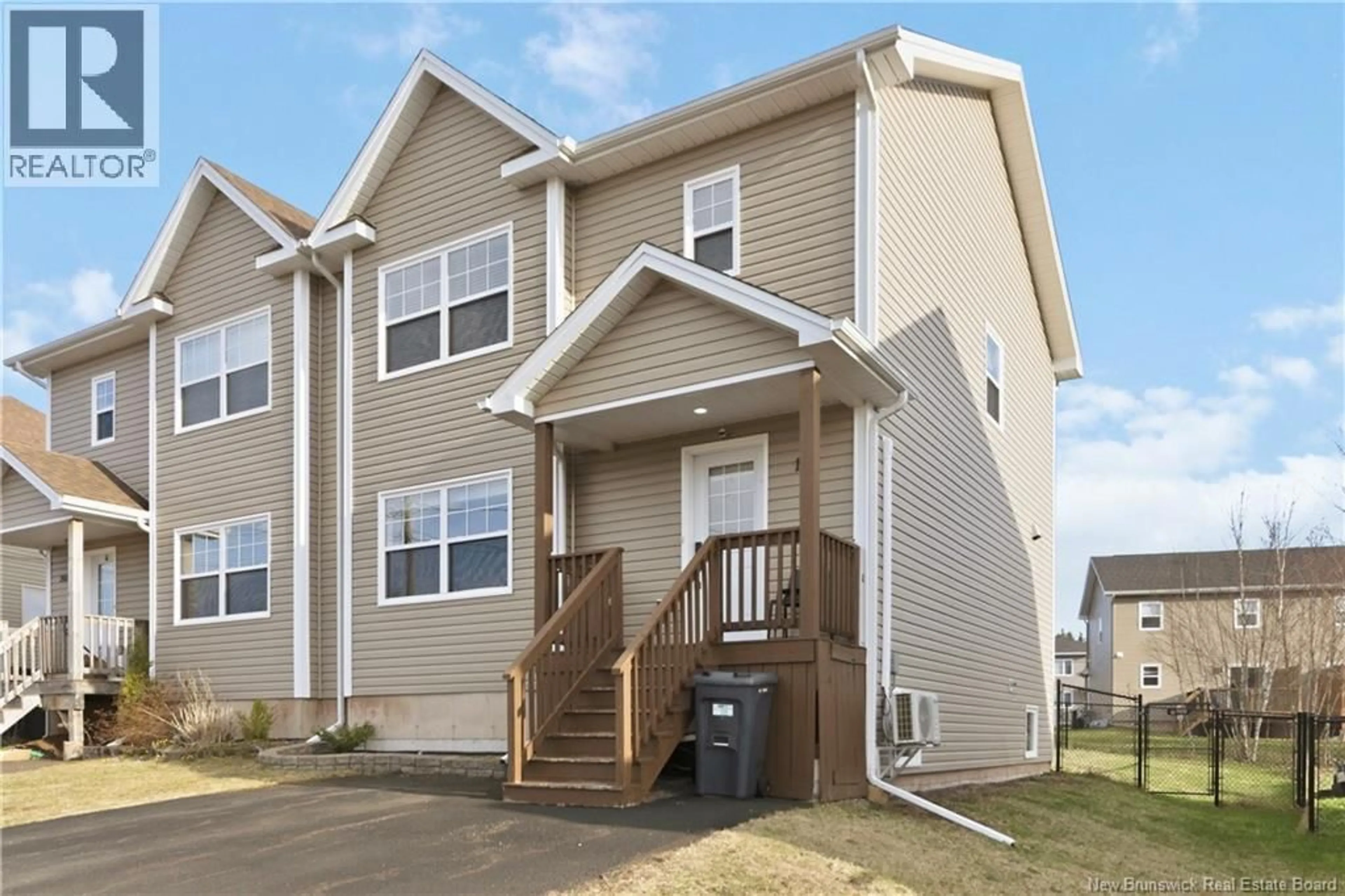 Home with vinyl exterior material, street for 199 BELLE FORET, Dieppe New Brunswick E1A7N3