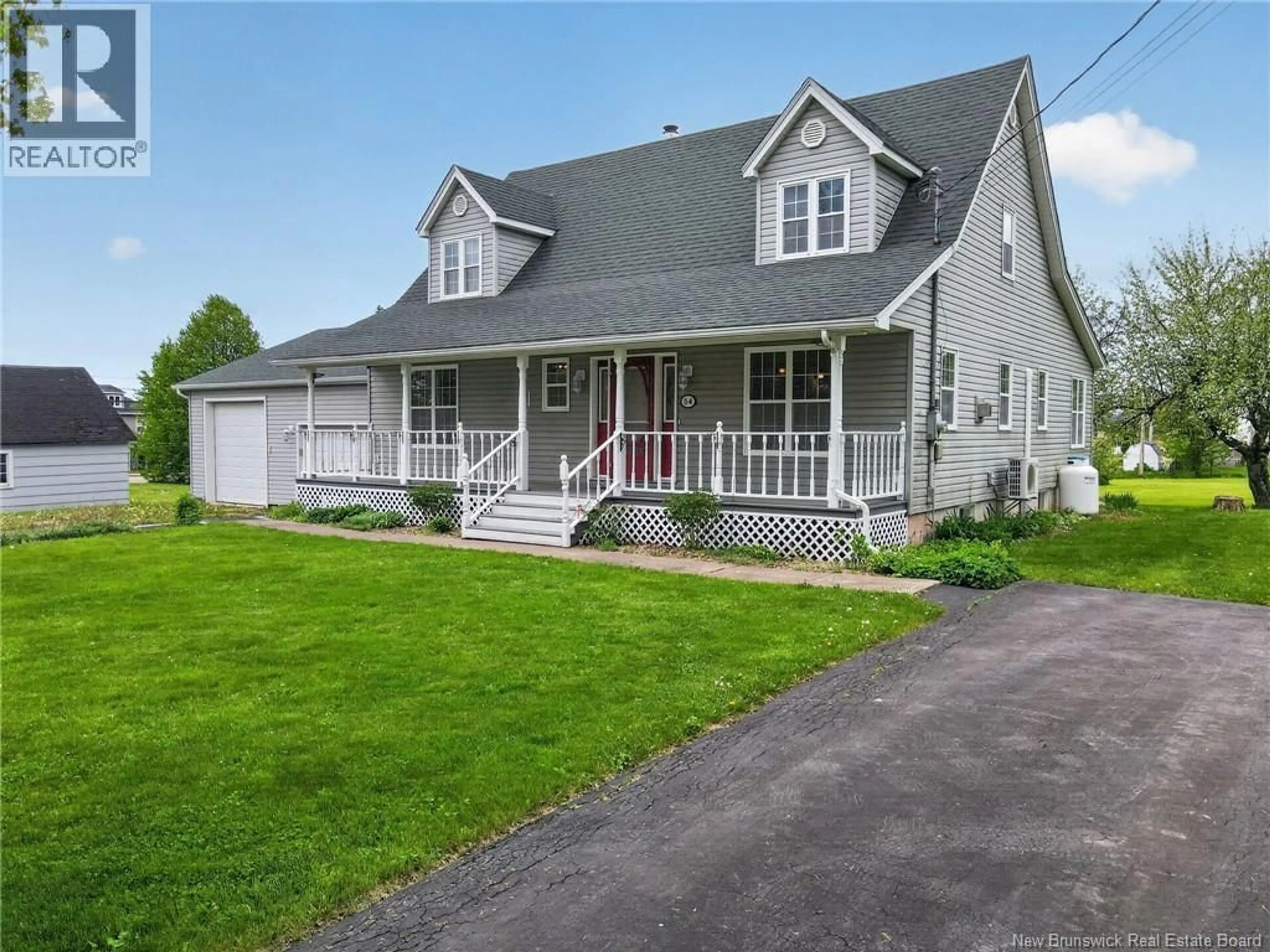 Home with vinyl exterior material, street for 54 PETER STREET, Salisbury New Brunswick E4J2N9