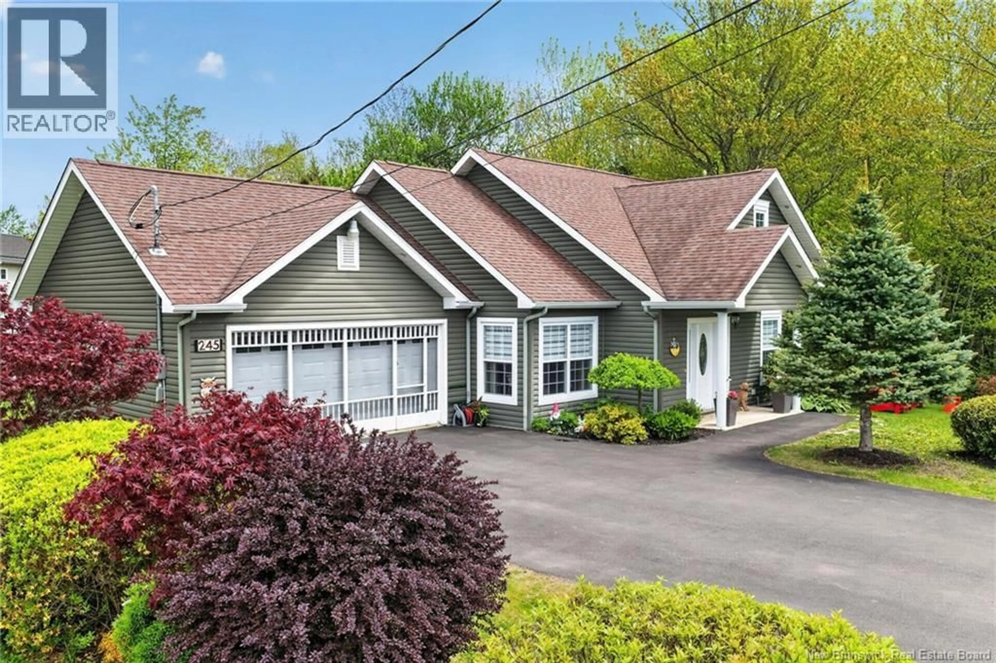Home with vinyl exterior material, street for 245 YVON STREET, Saint-Antoine New Brunswick E4V1K9