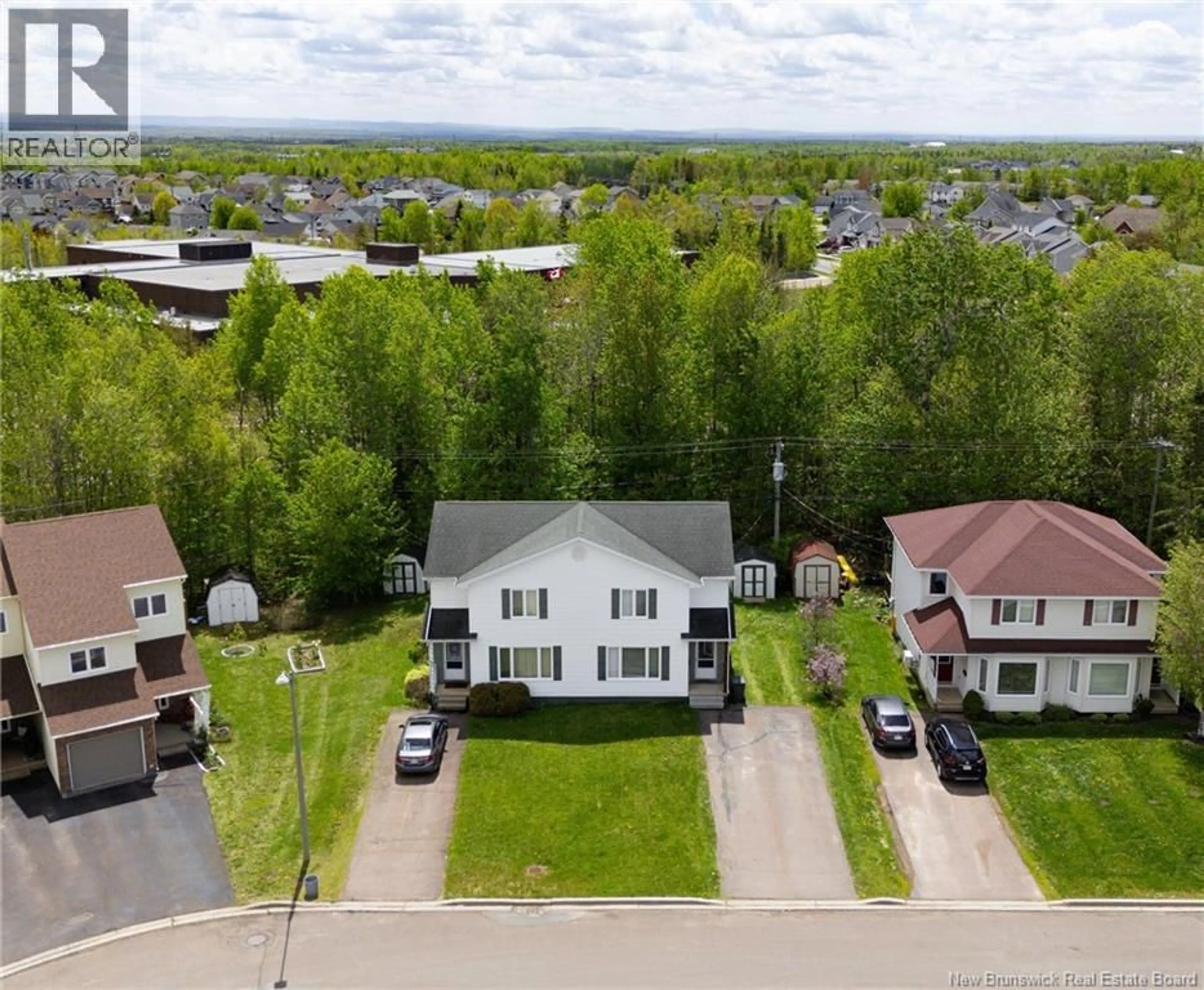 A pic from outside/outdoor area/front of a property/back of a property/a pic from drone, water/lake/river/ocean view for 34 SABLE, Moncton New Brunswick E1G2H5