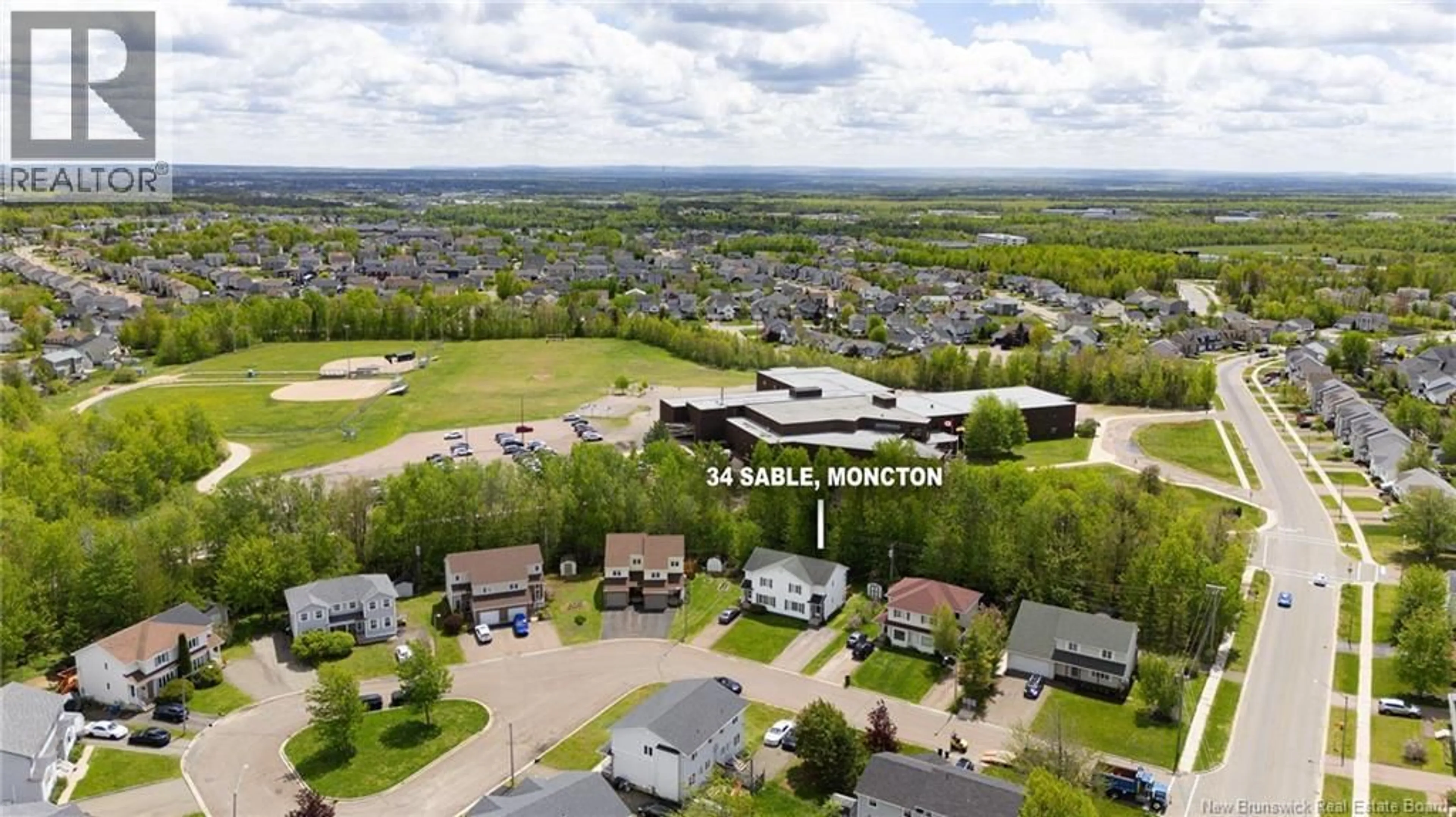 A pic from outside/outdoor area/front of a property/back of a property/a pic from drone, mountain view for 34 SABLE, Moncton New Brunswick E1G2H5