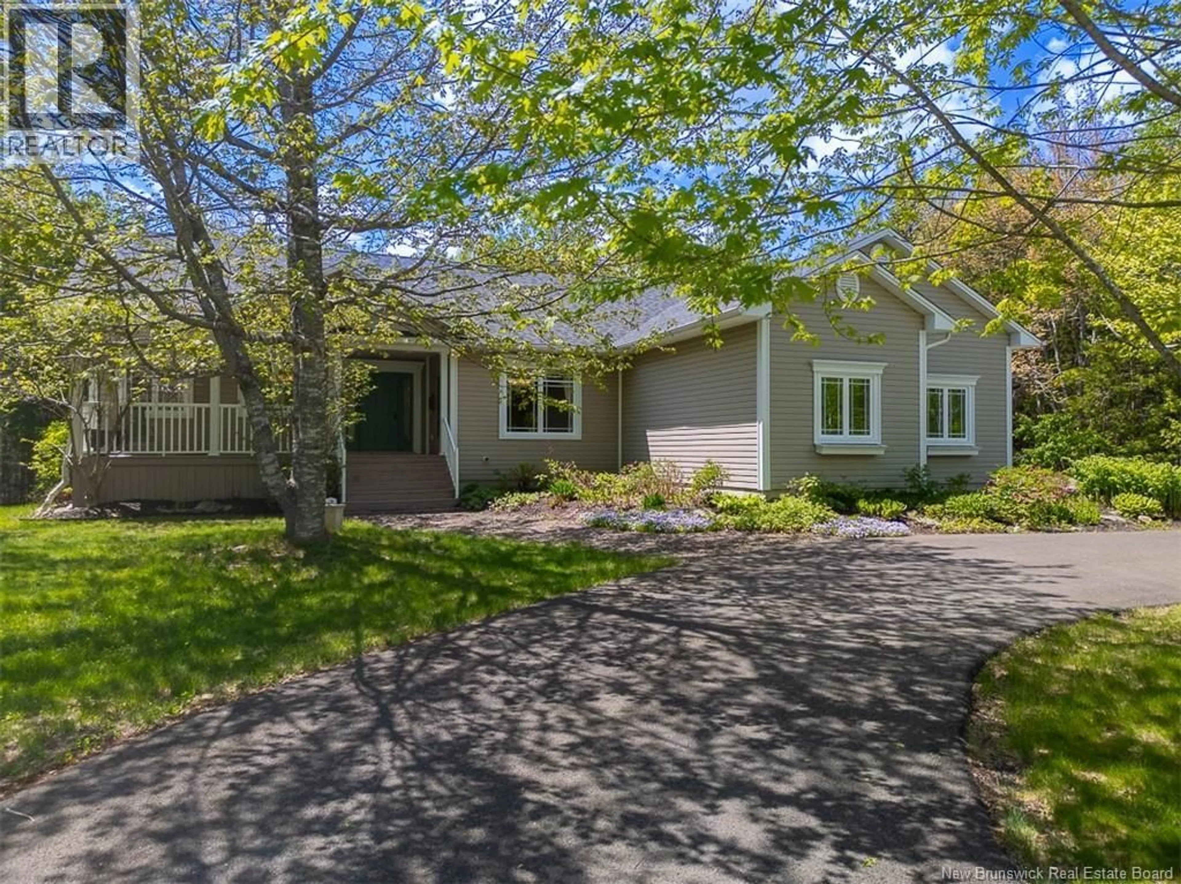 A pic from outside/outdoor area/front of a property/back of a property/a pic from drone, street for 49 STARLING CRESCENT, Hanwell New Brunswick E3E2P8
