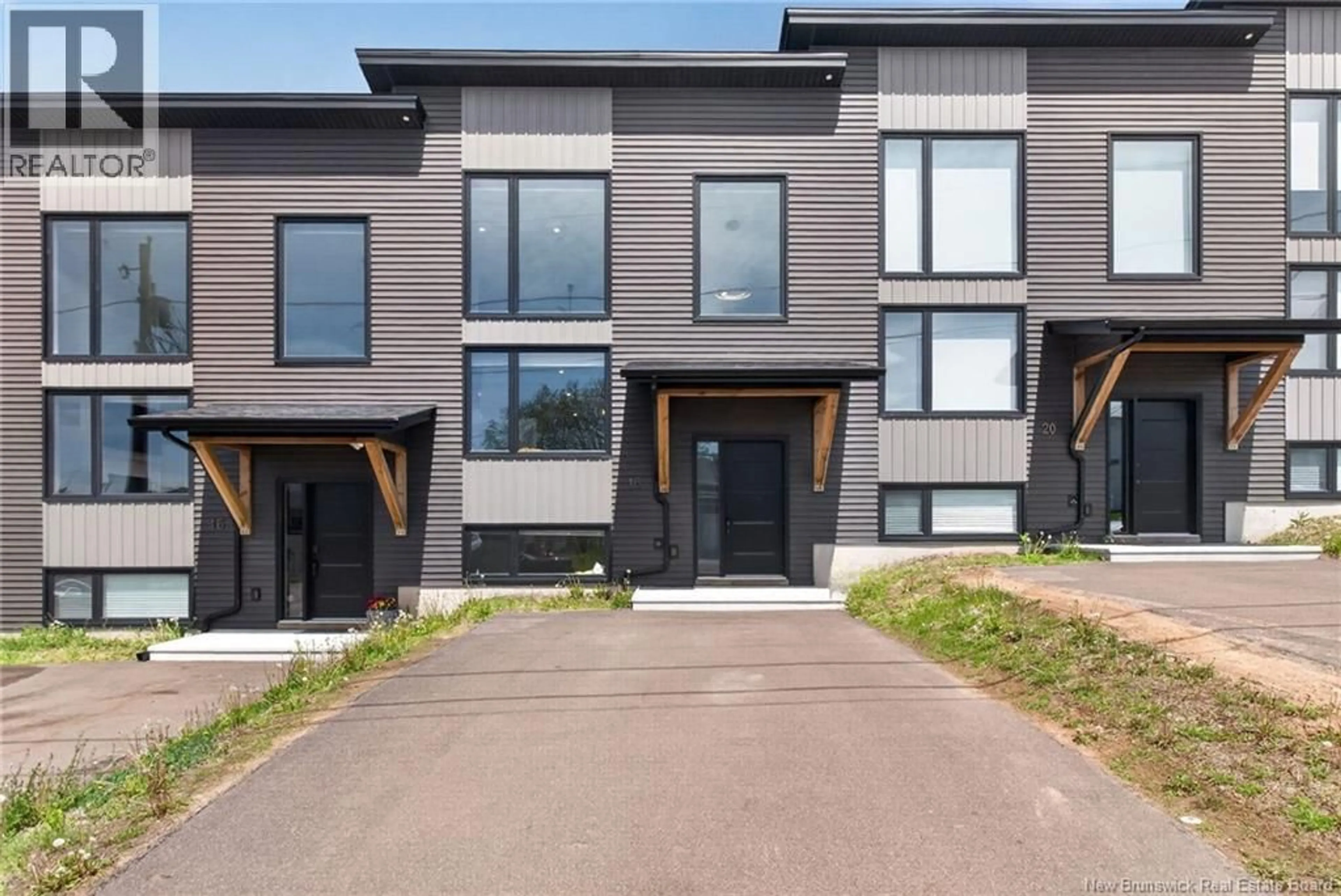 Home with brick exterior material, street for 18 DE LA COLLINE, Dieppe New Brunswick E1A6N3