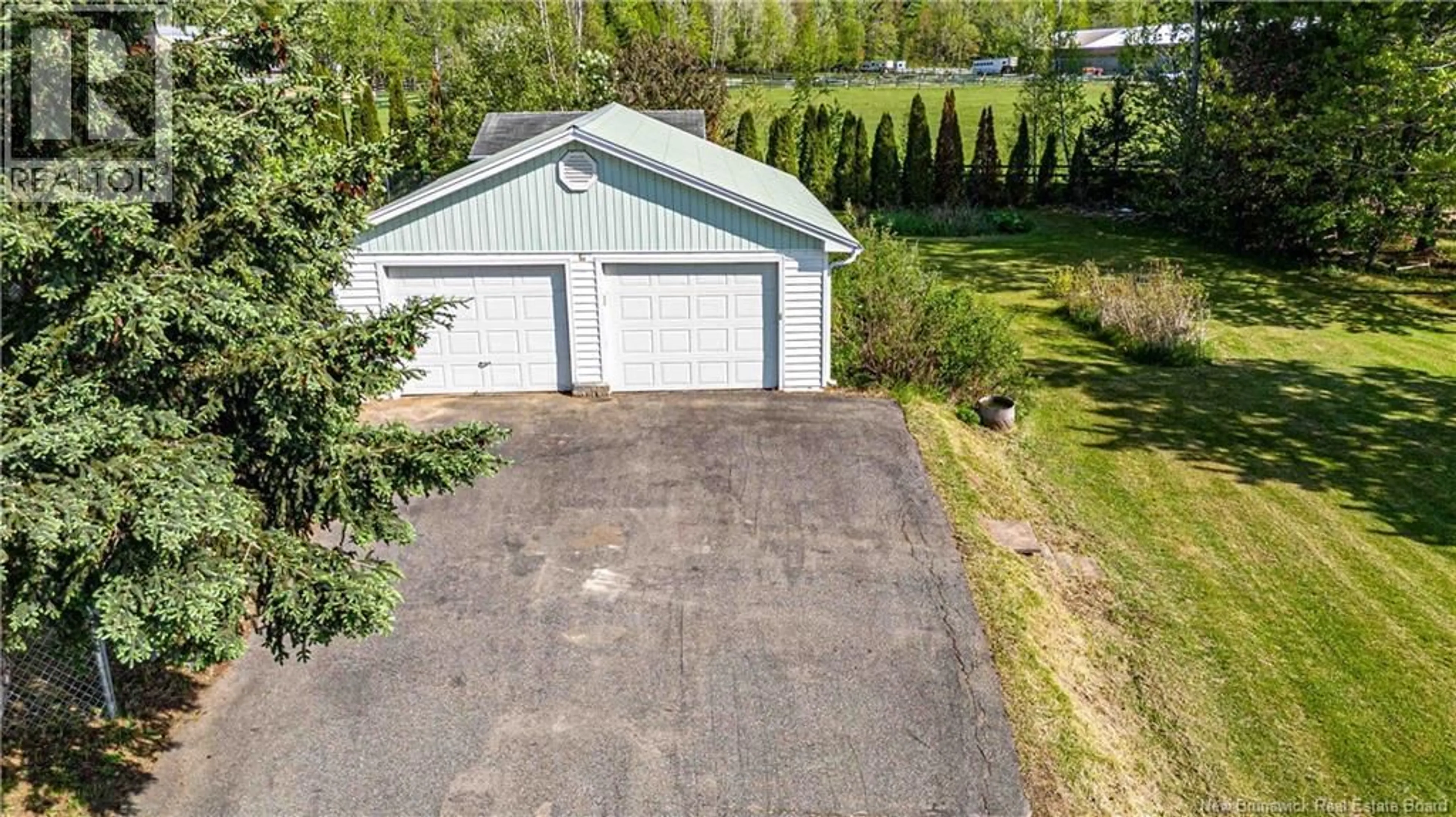 A pic from outside/outdoor area/front of a property/back of a property/a pic from drone, street for 19 NEW ROAD, Geary New Brunswick E2V4A7
