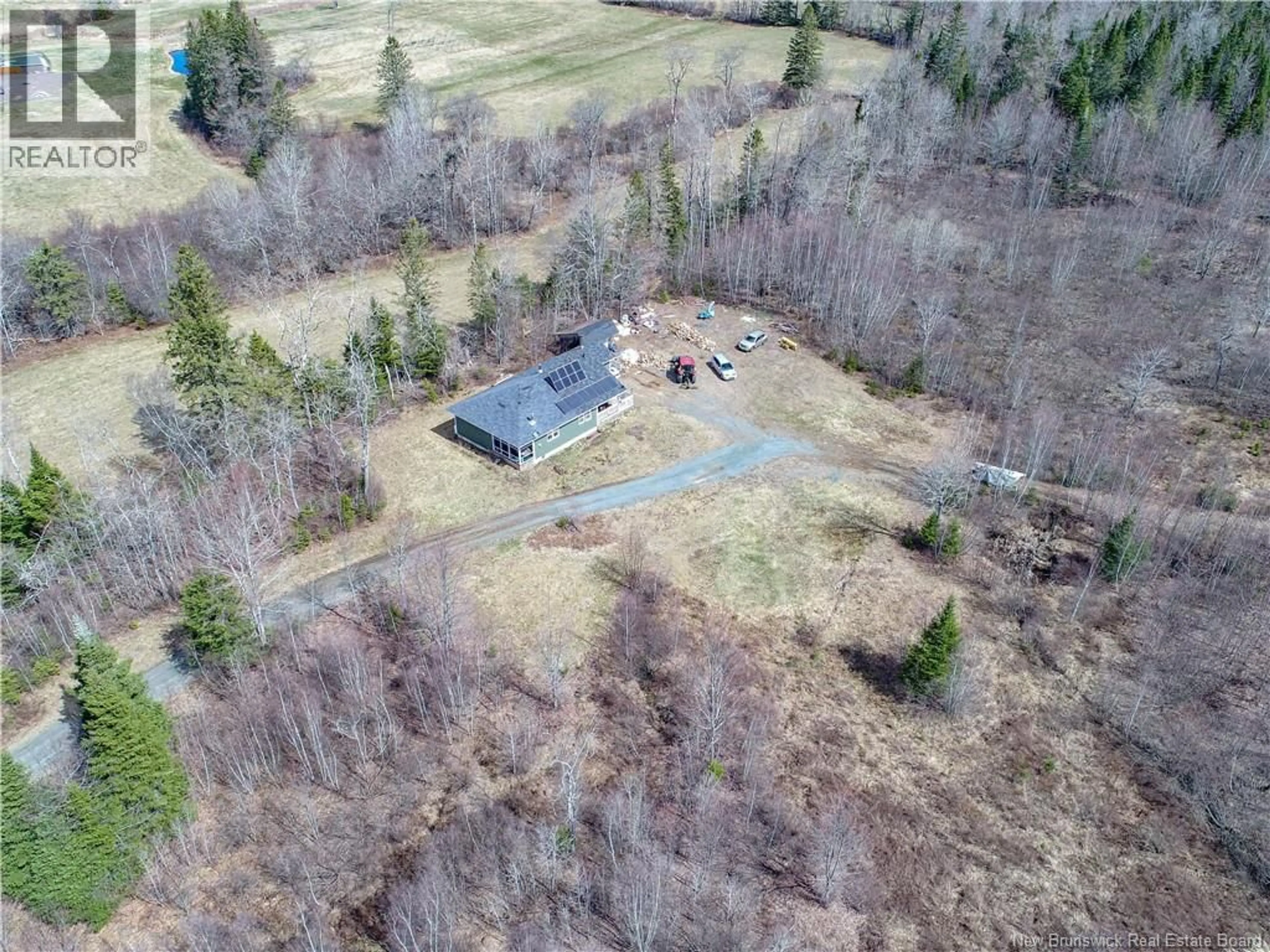 A pic from outside/outdoor area/front of a property/back of a property/a pic from drone, unknown for 1831 ROUTE 870, Springfield New Brunswick E5T2H9