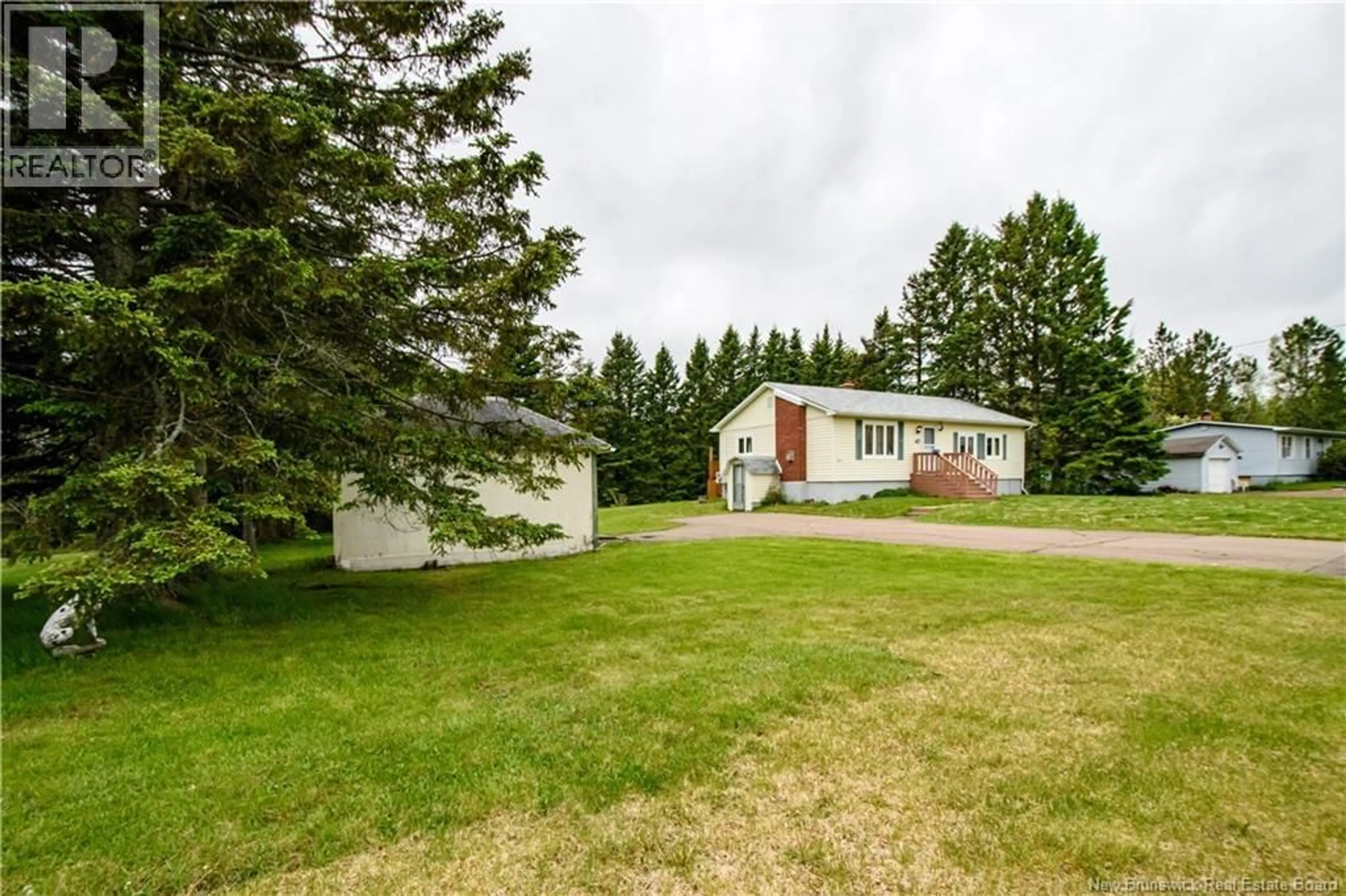 A pic from outside/outdoor area/front of a property/back of a property/a pic from drone, unknown for 910 MAPLETON ROAD, Moncton New Brunswick E1G2K7