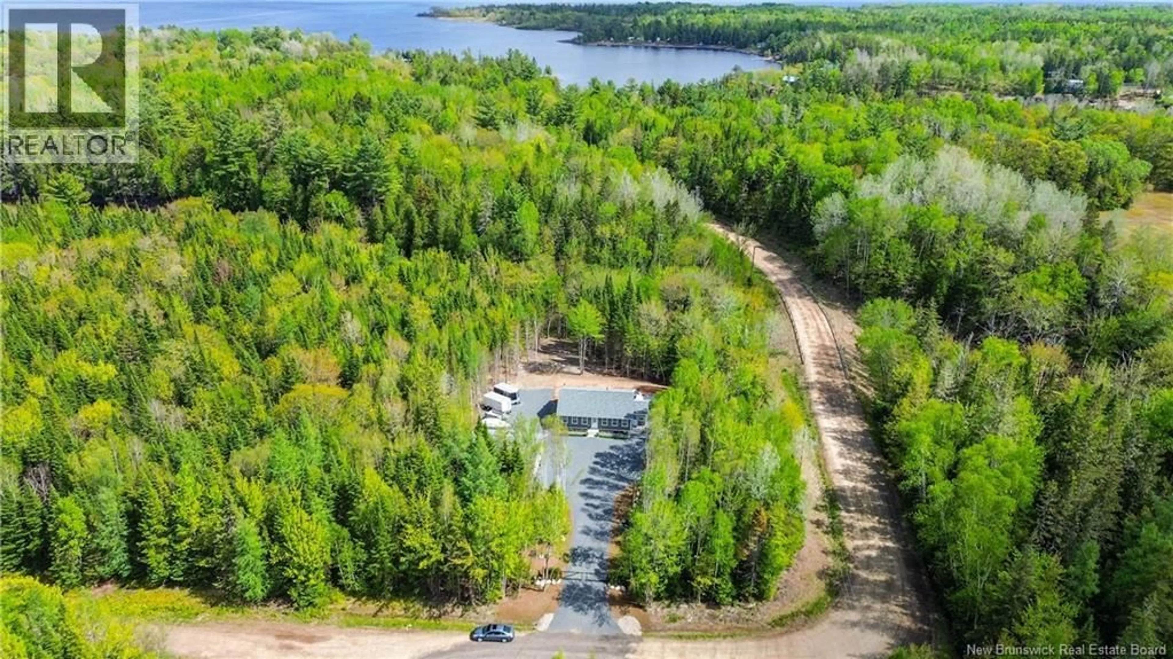 A pic from outside/outdoor area/front of a property/back of a property/a pic from drone, water/lake/river/ocean view for 9 WATERFRONT LANE, Newcastle Centre New Brunswick E4B2H2