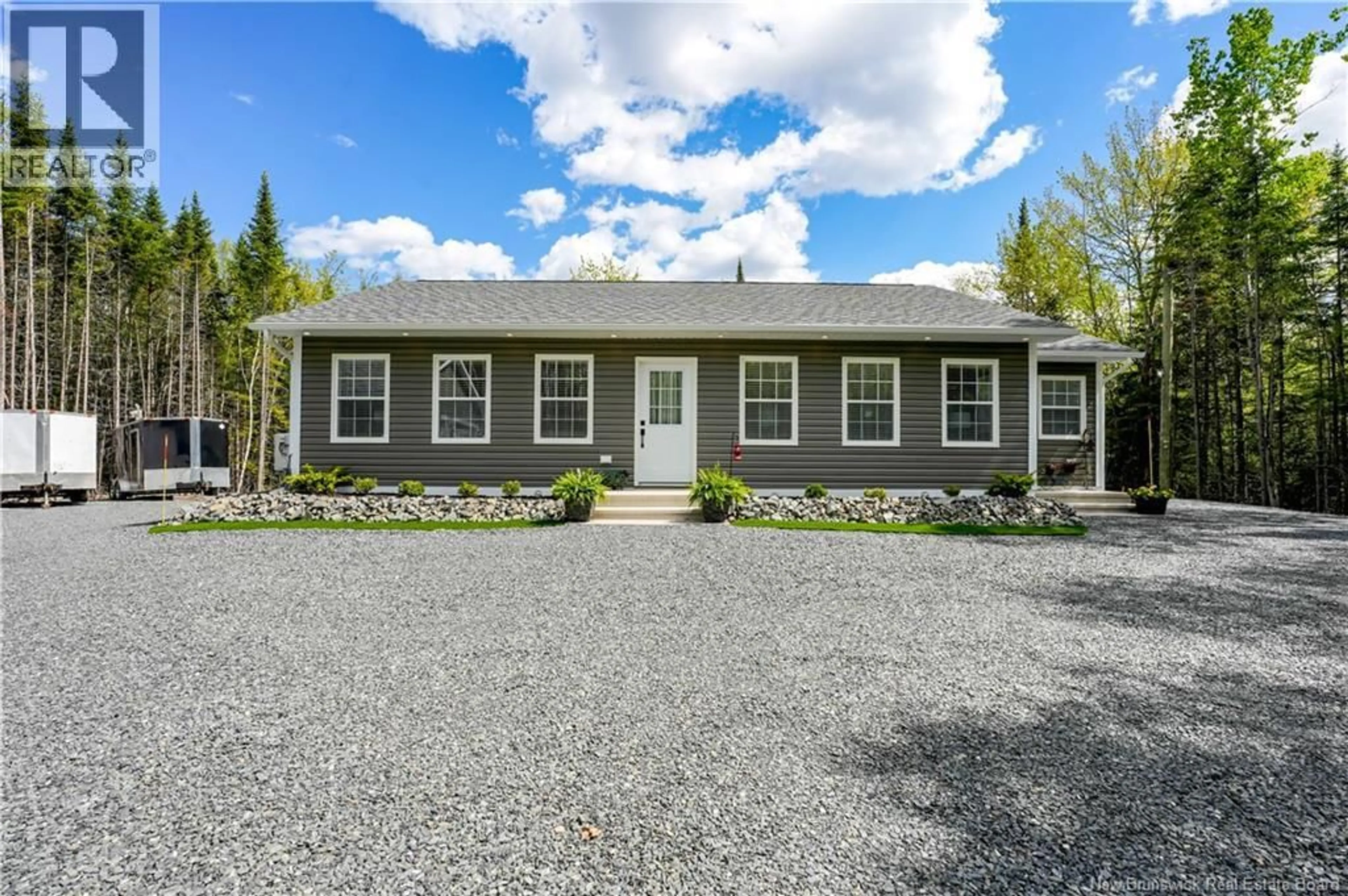 Home with vinyl exterior material, street for 9 WATERFRONT LANE, Newcastle Centre New Brunswick E4B2H2