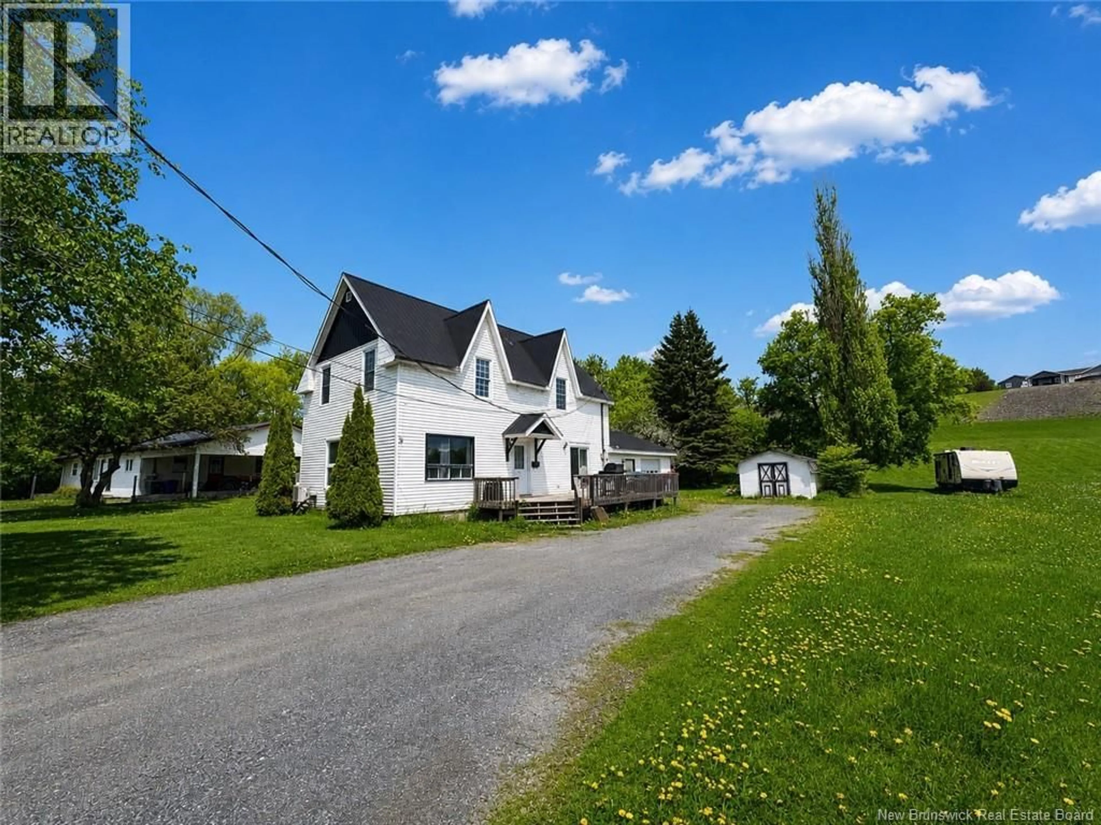 A pic from outside/outdoor area/front of a property/back of a property/a pic from drone, street for 166 MAIN STREET, Hartland New Brunswick E7P2M5